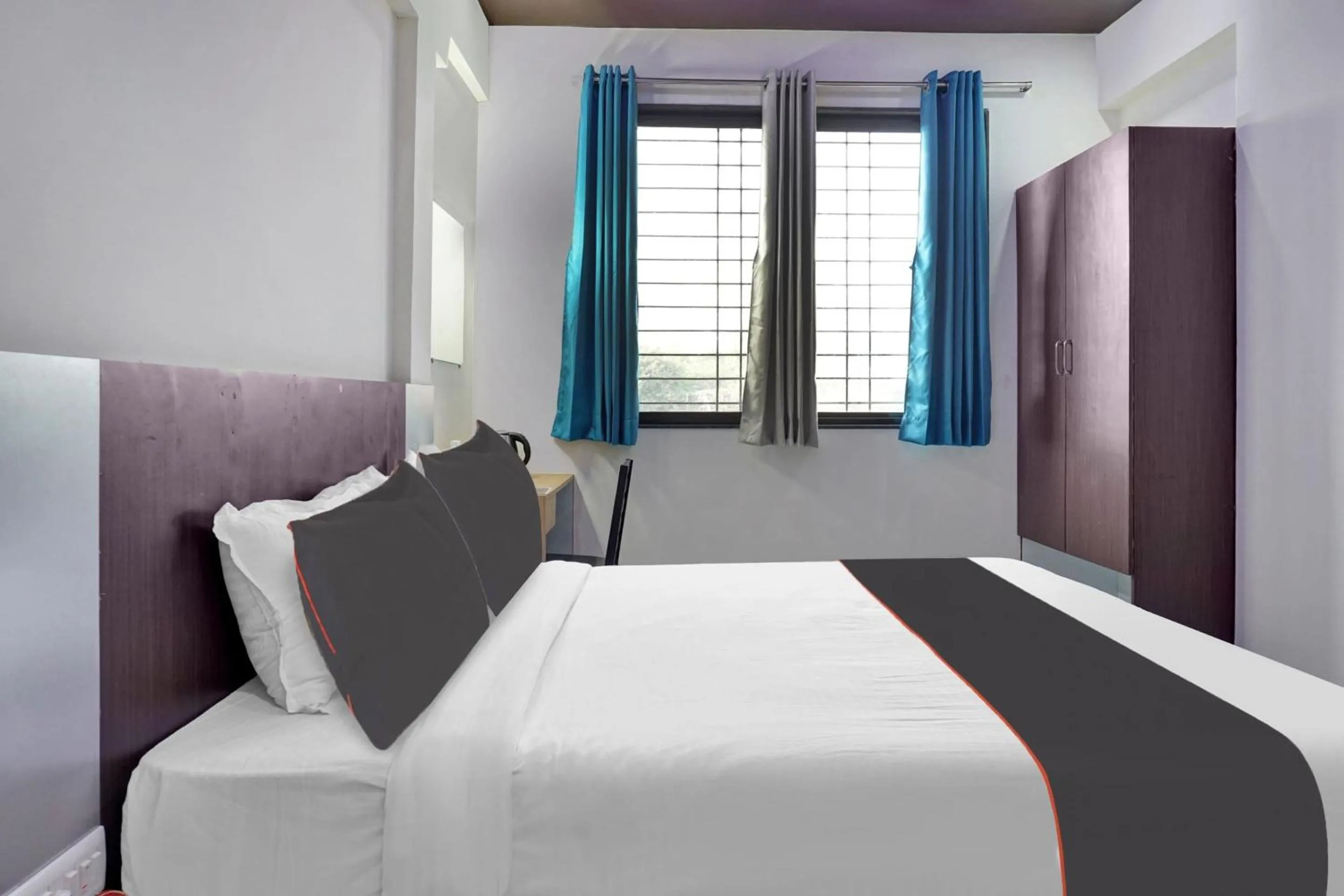 Bedroom, Bed in Super Collection O Eon Inn Near Pune Airport