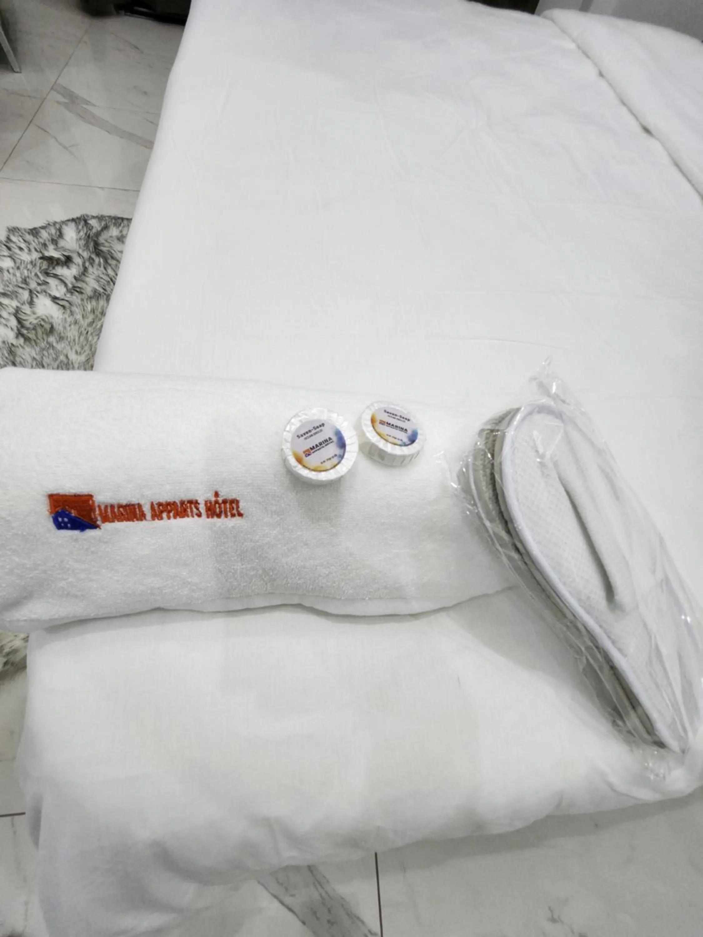 towels, Bed in MARINA APPART Hôtel