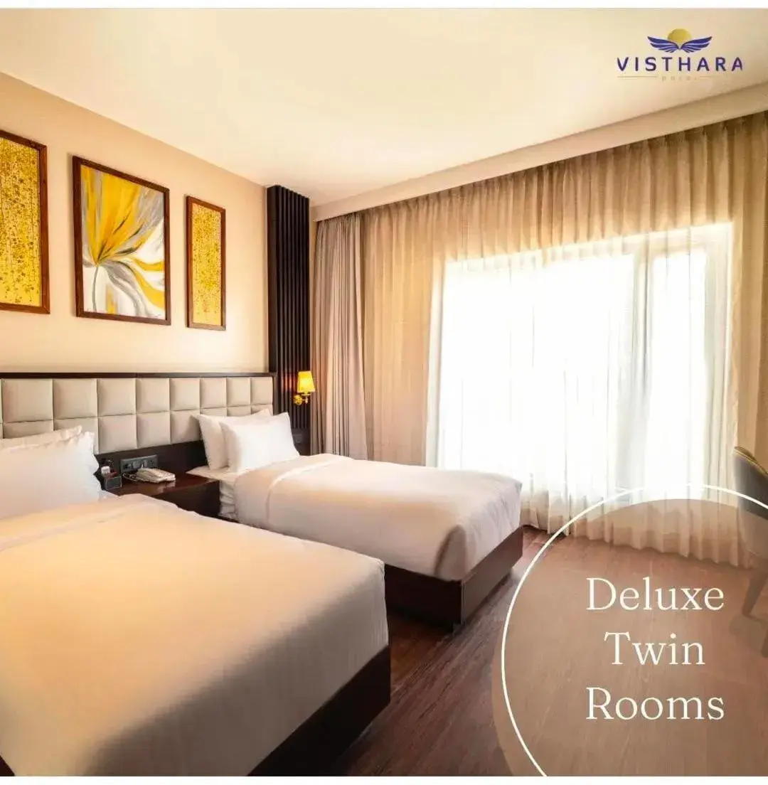 Bed in Visthara Hotel Bed in Visthara Hotel