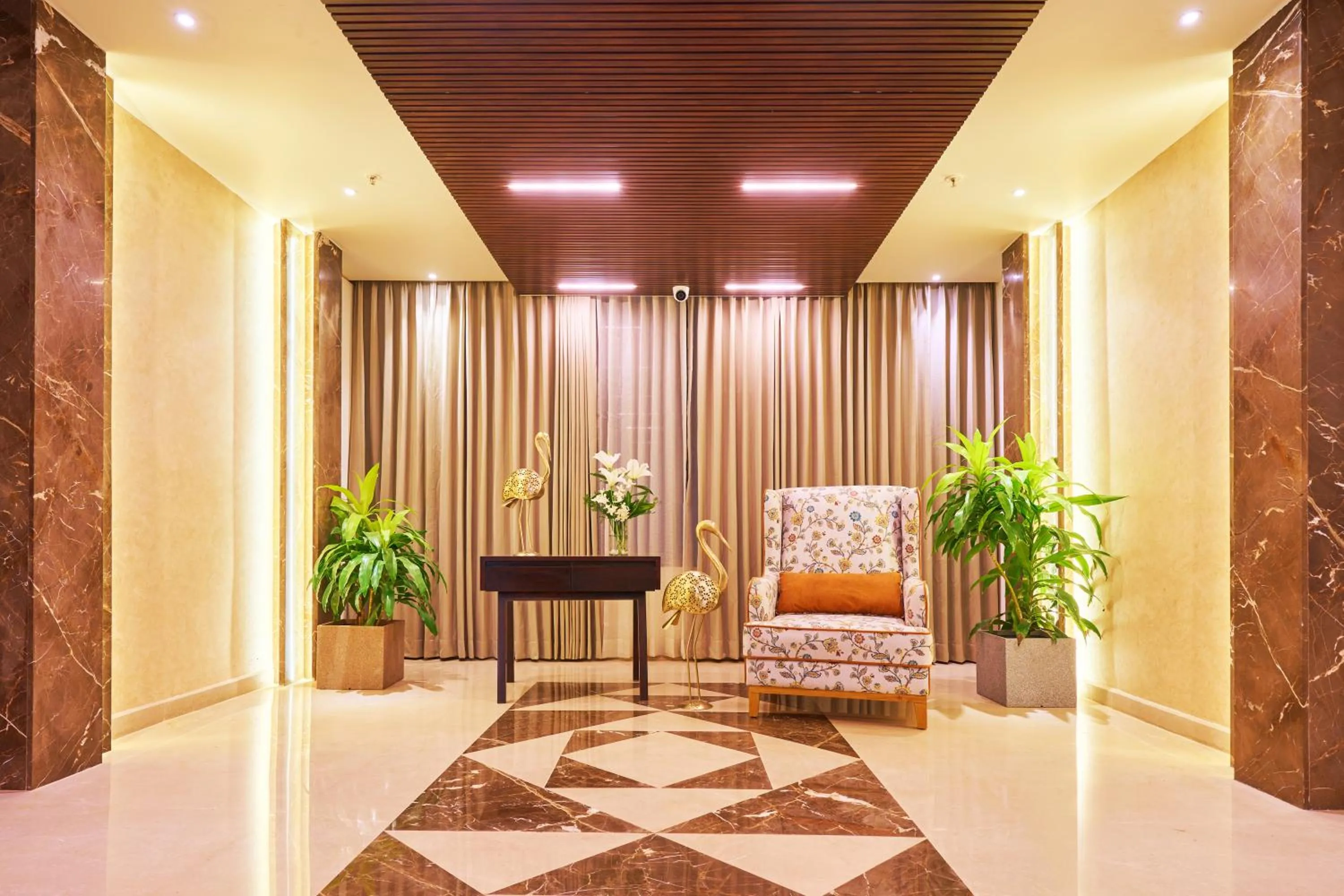 Seating area in Visthara Hotel