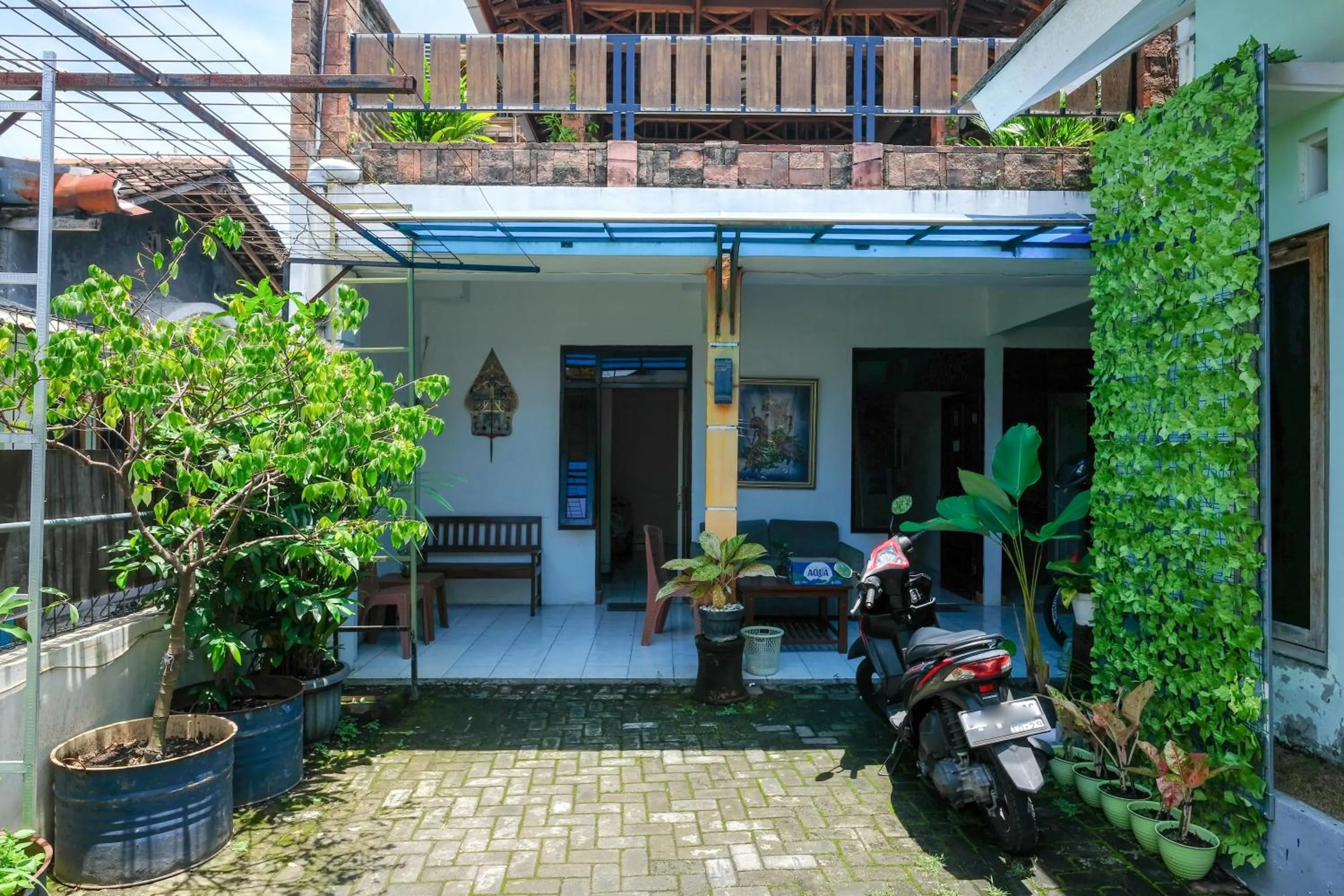 Seating area in OYO 91803 Gita Graha Guest House Syariah