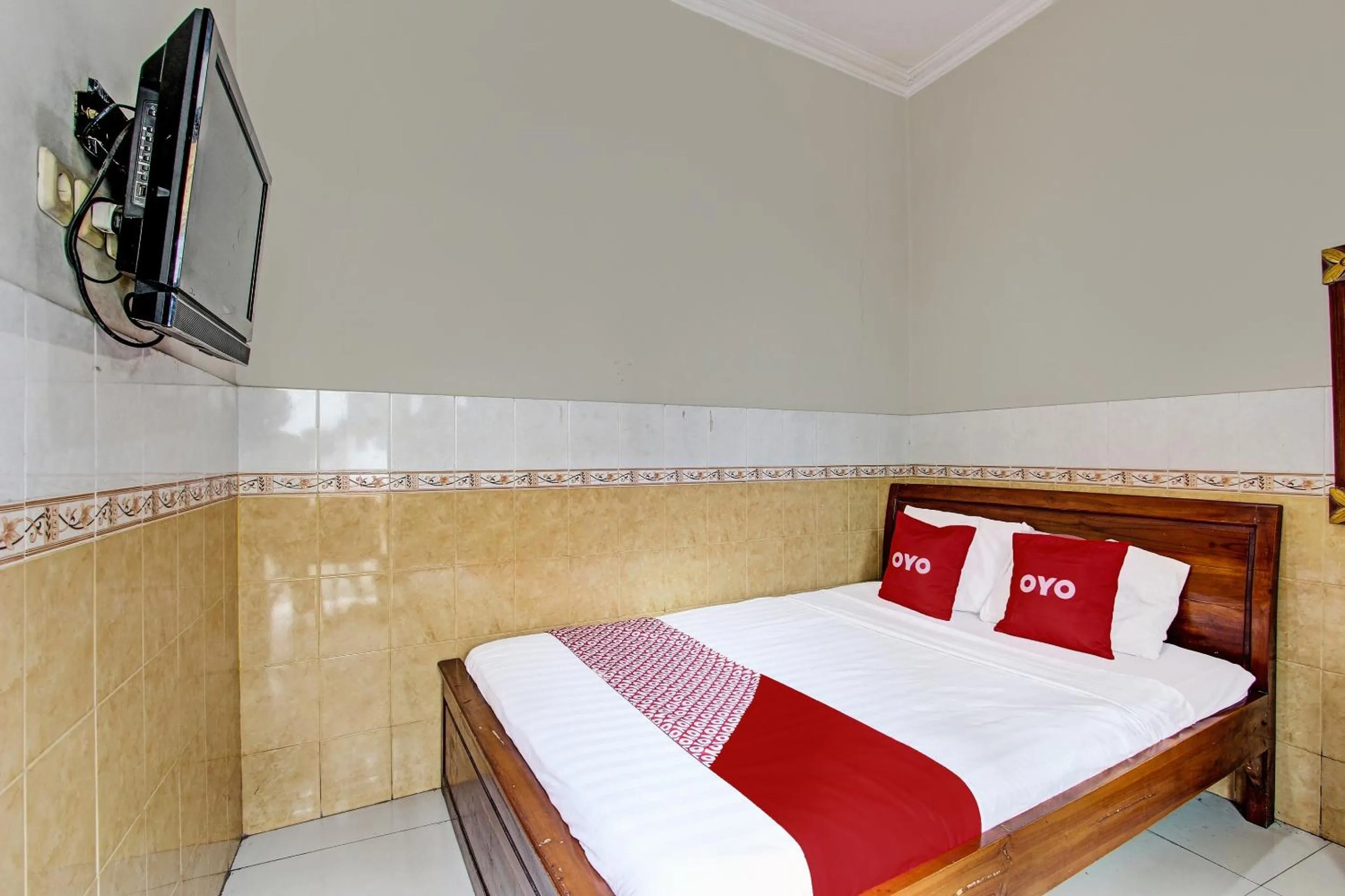 Bedroom in OYO 91785 Hotel Srikandi Kalasan