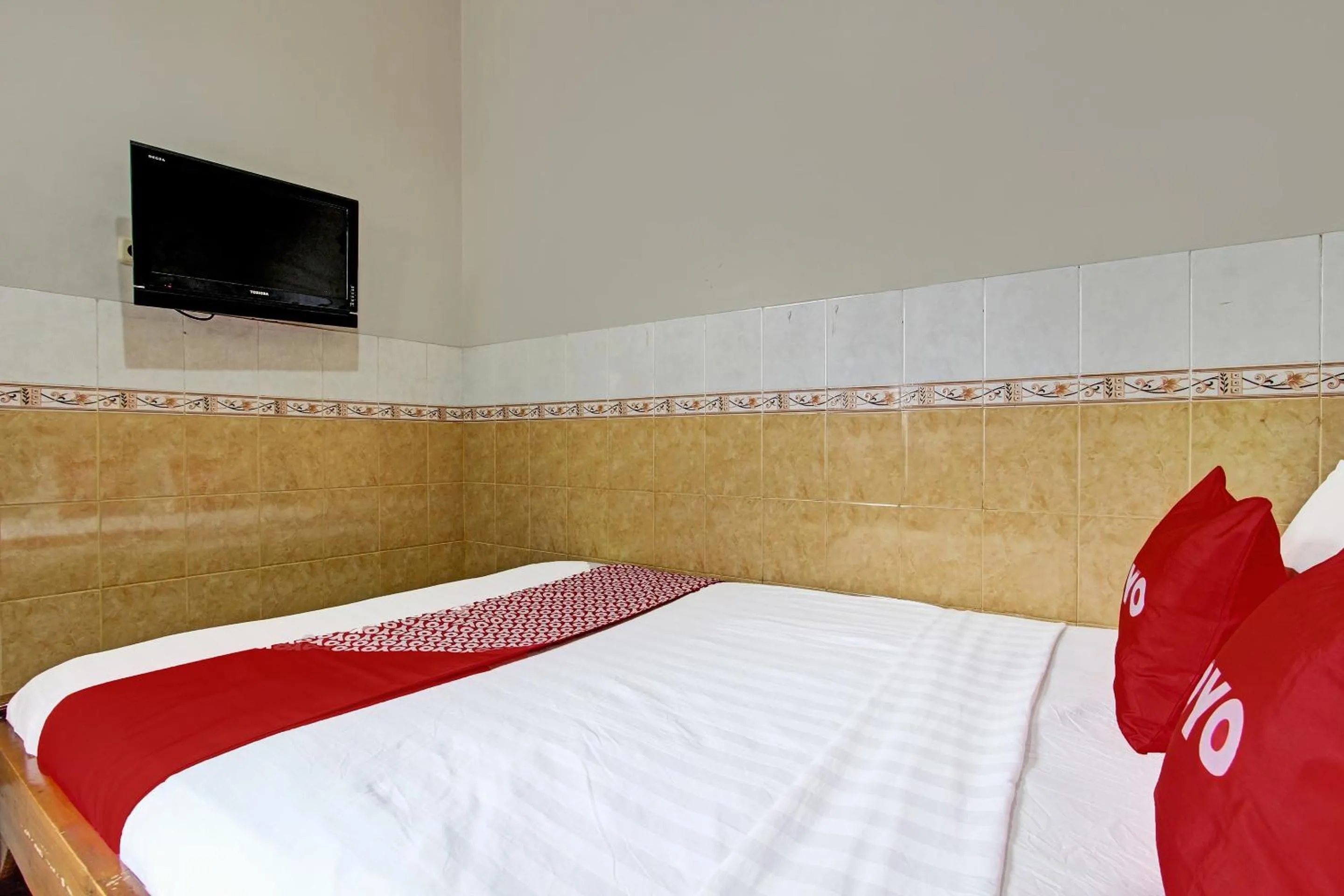 Bedroom in OYO 91785 Hotel Srikandi Kalasan