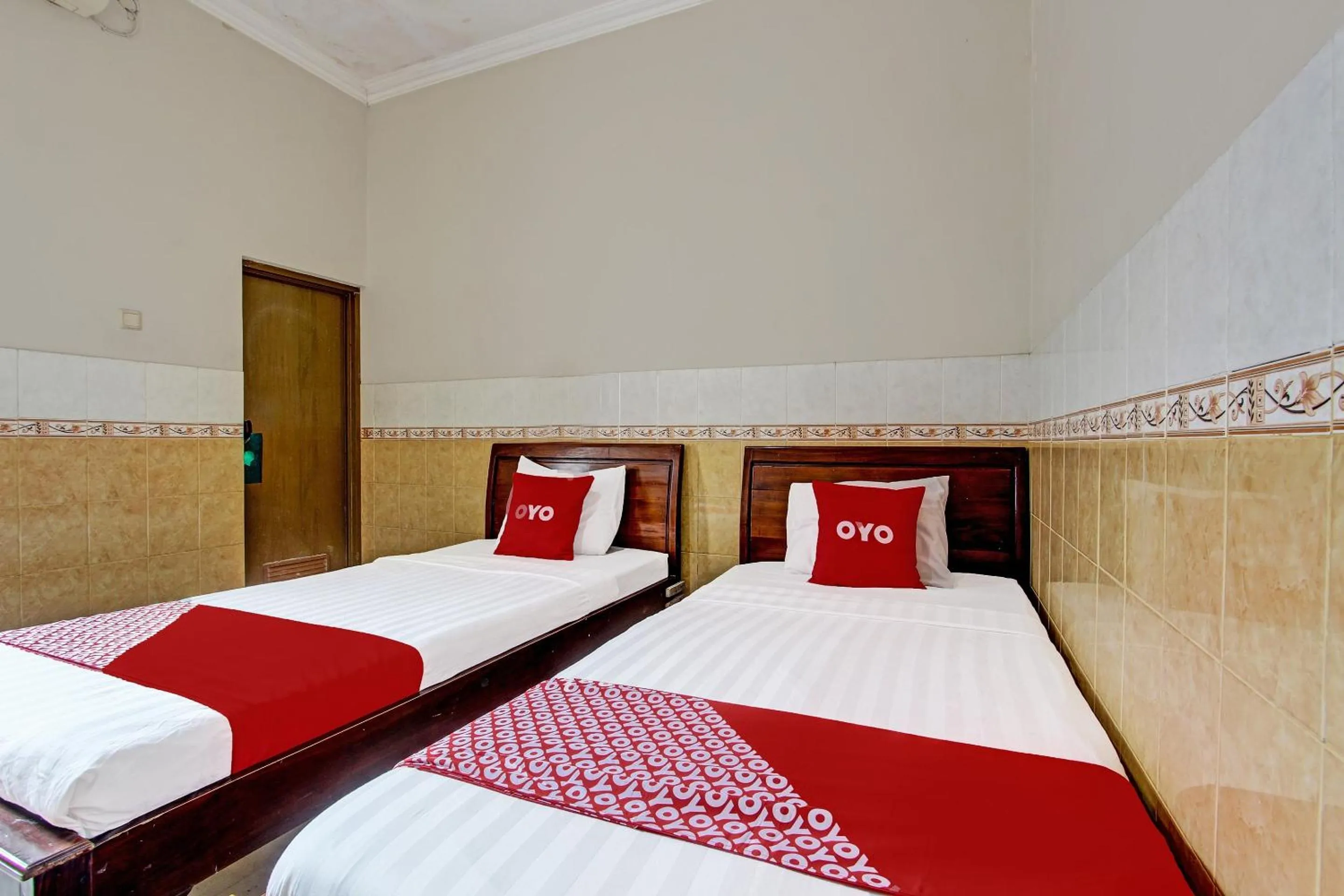 Bedroom in OYO 91785 Hotel Srikandi Kalasan