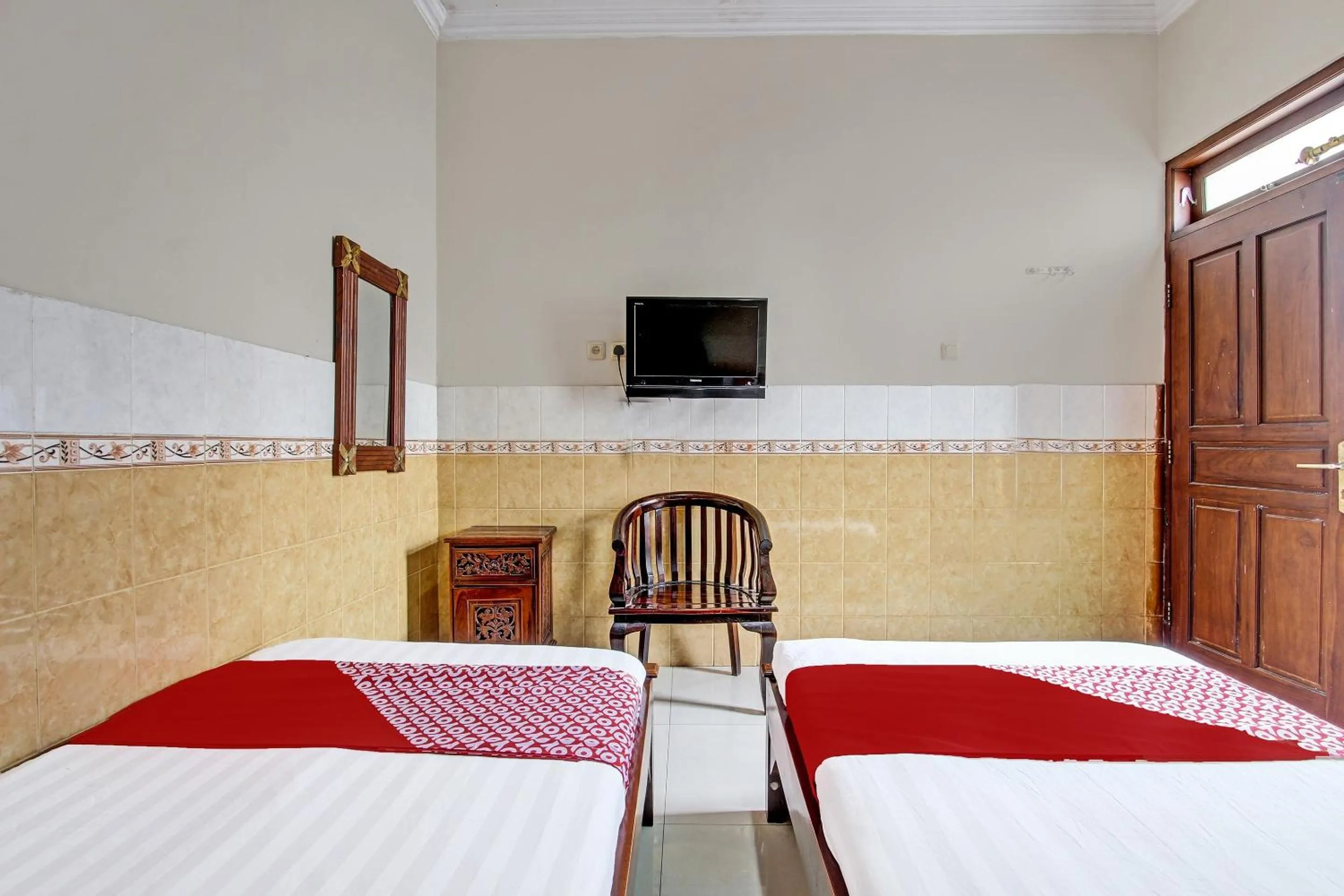 Bedroom in OYO 91785 Hotel Srikandi Kalasan