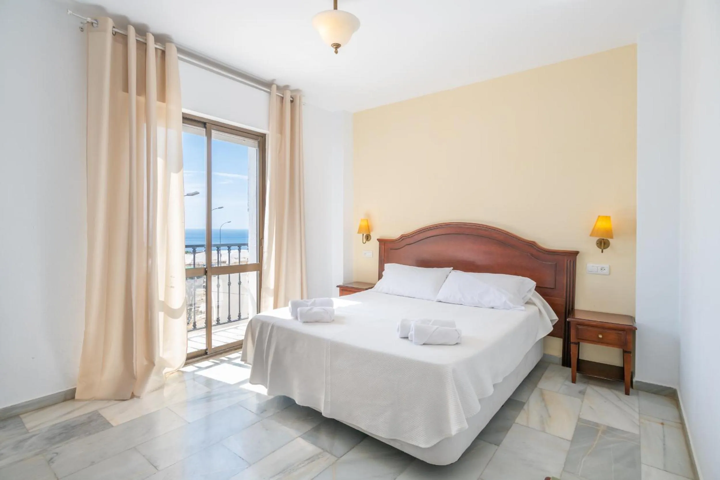 Photo of the whole room, Bed in Apartahotel Playamaro by Dorobe