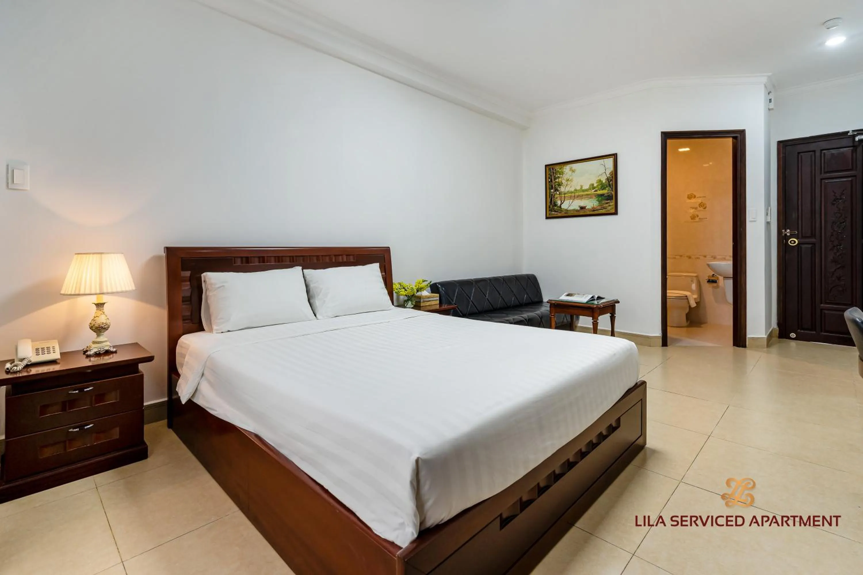 Bed in LILA Hotel & Apartments