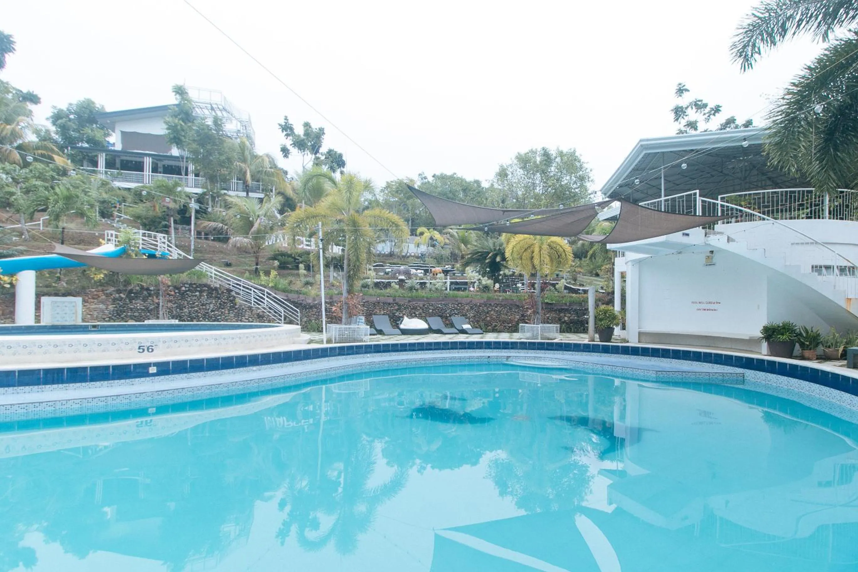Swimming pool in RedDoorz @ Marceily Point Resort Guimaras