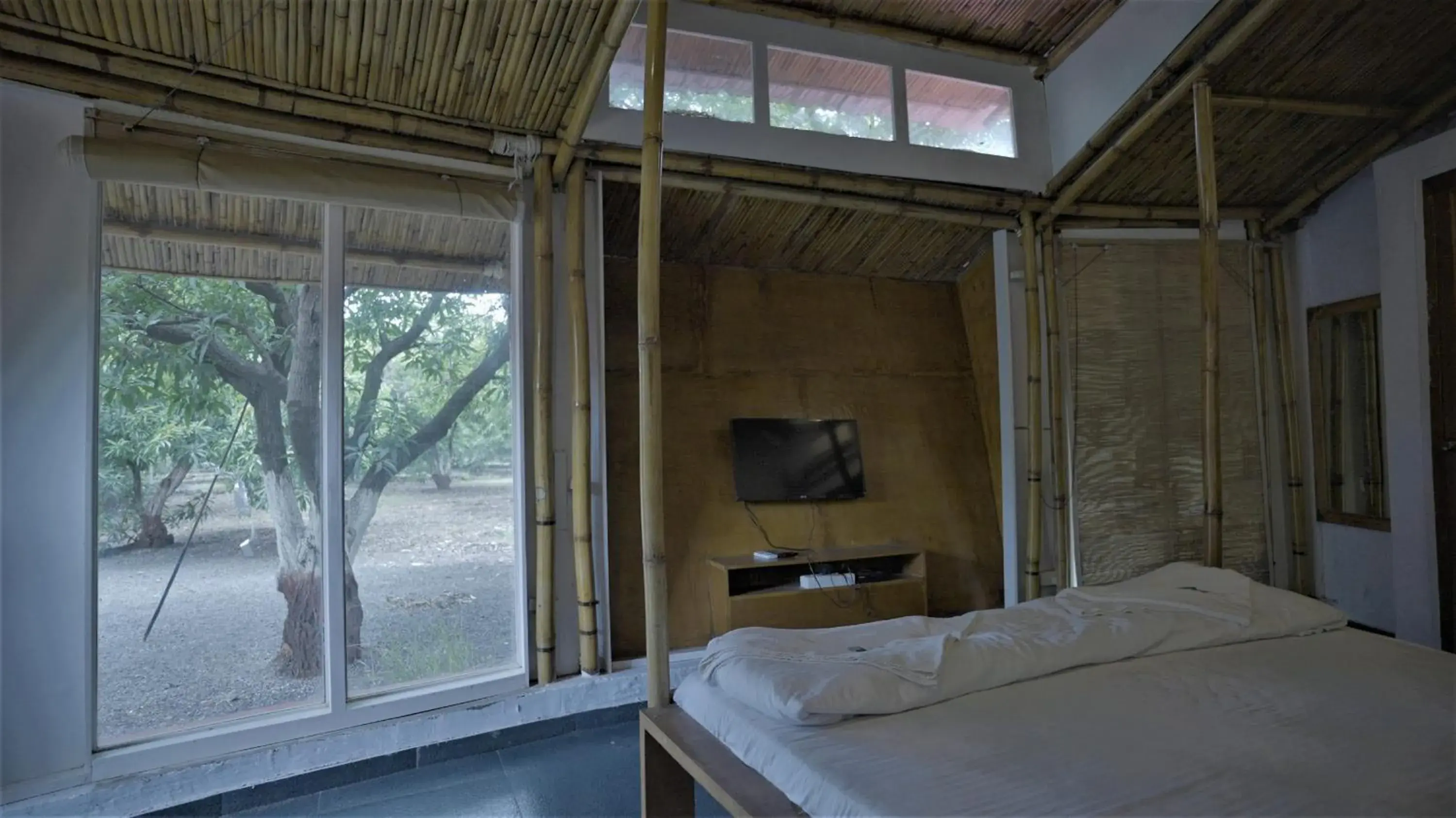 Bedroom, Bed in Amraness Luxury Resort Sasan Gir Bedroom, Bed in Amraness Luxury Resort Sasan Gir