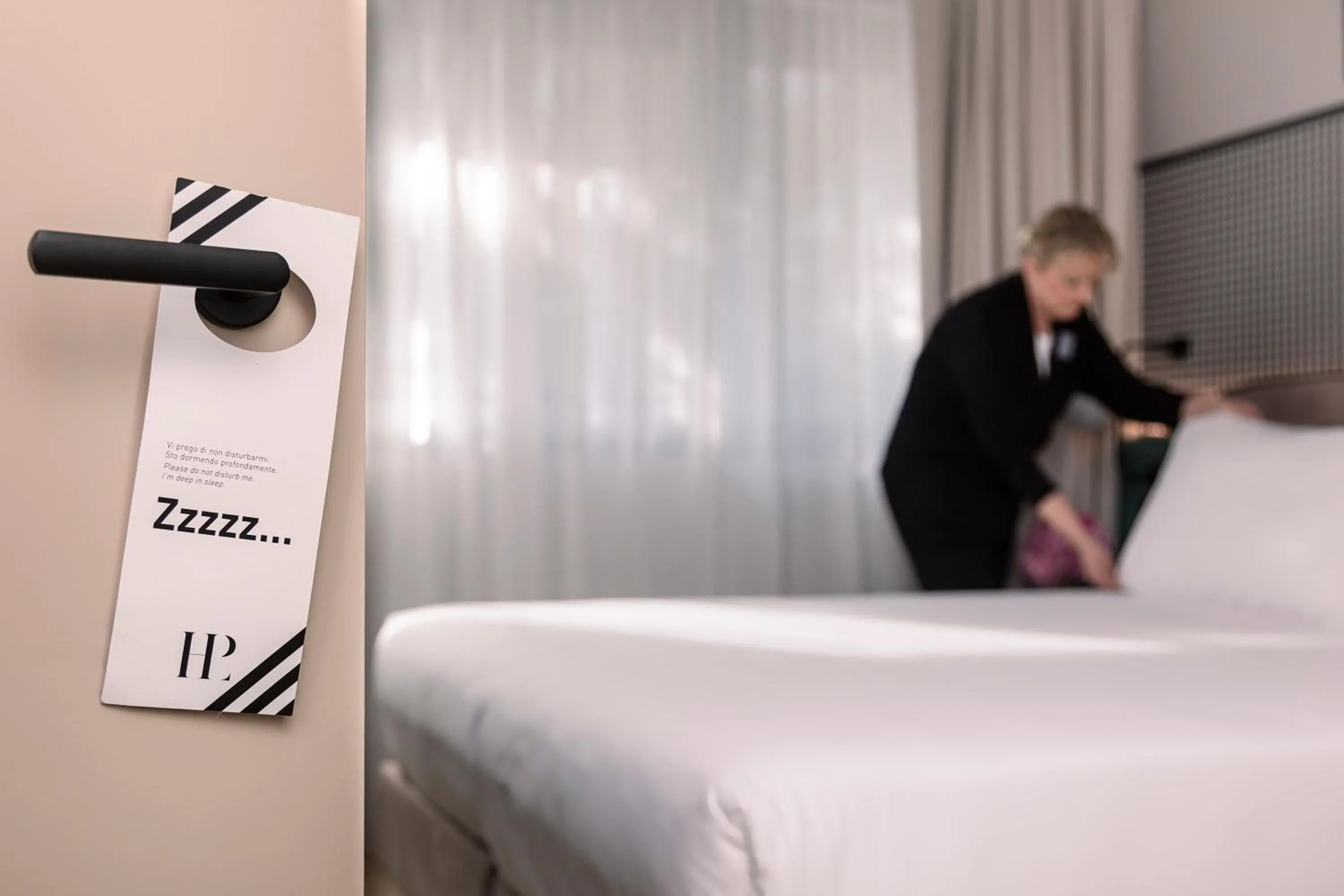 Bed in Living Place Hotel