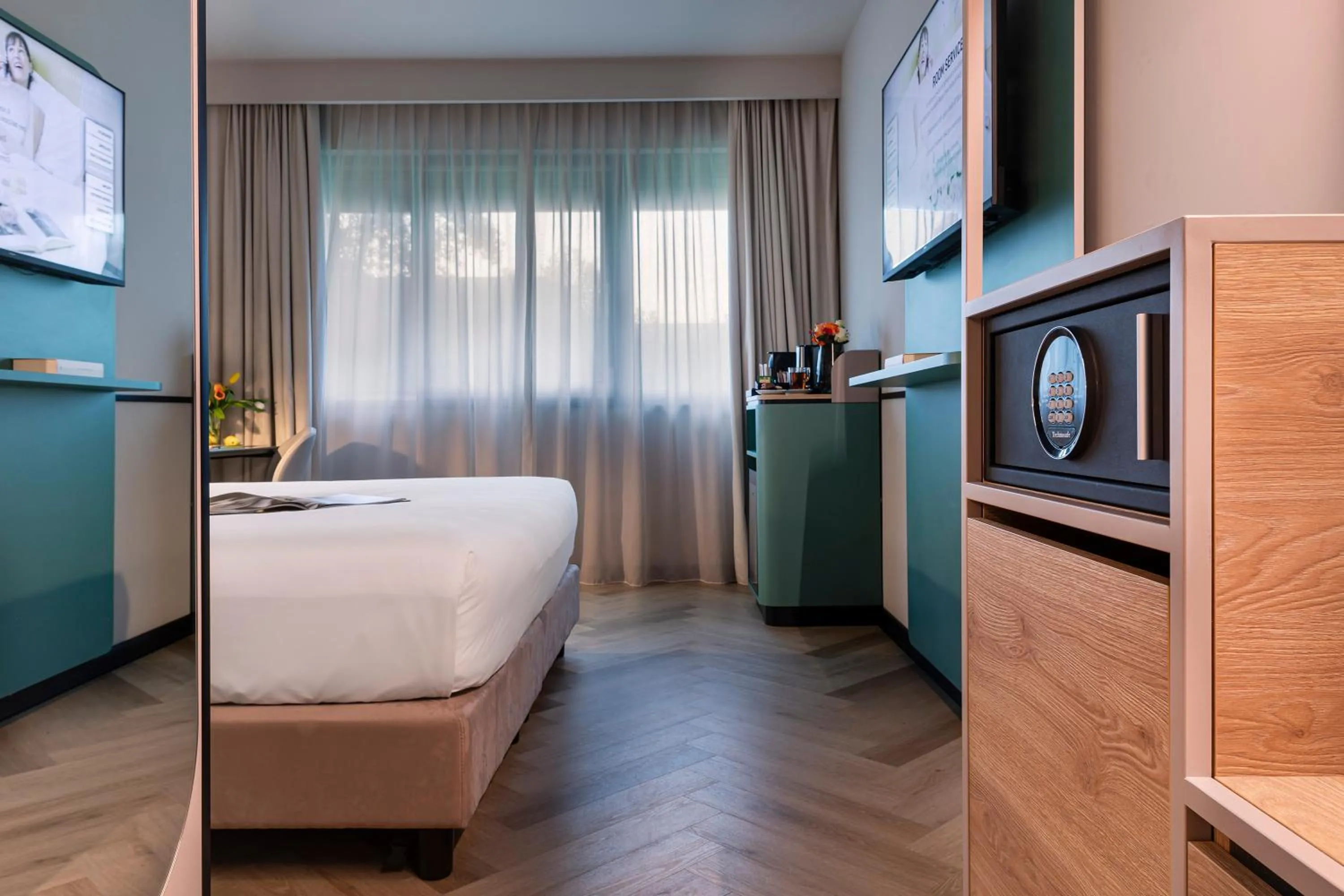 Photo of the whole room, Bed in Living Place Hotel