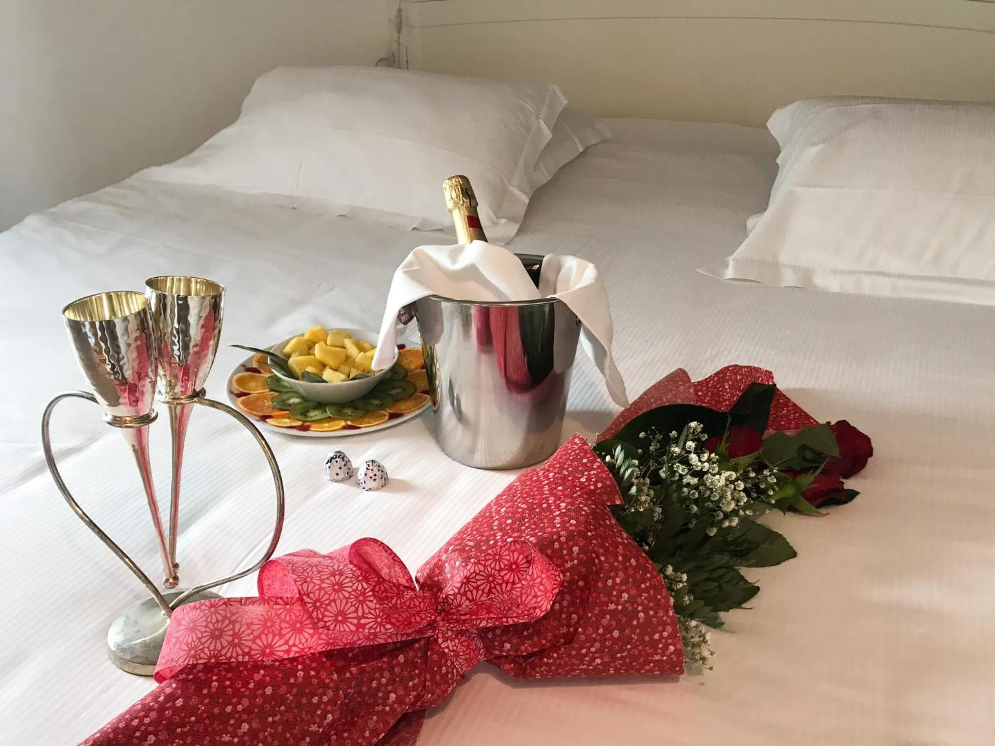 Decorative detail, Bed in Rimini Suite Hotel