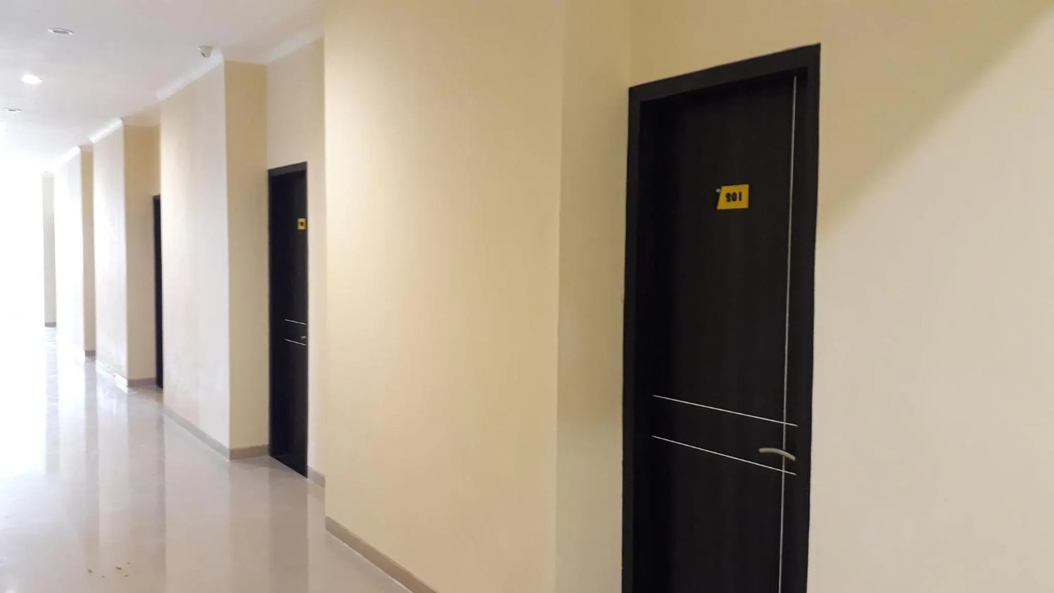 Communal lounge/ TV room in Harmony Inn Belitung - City Hotel