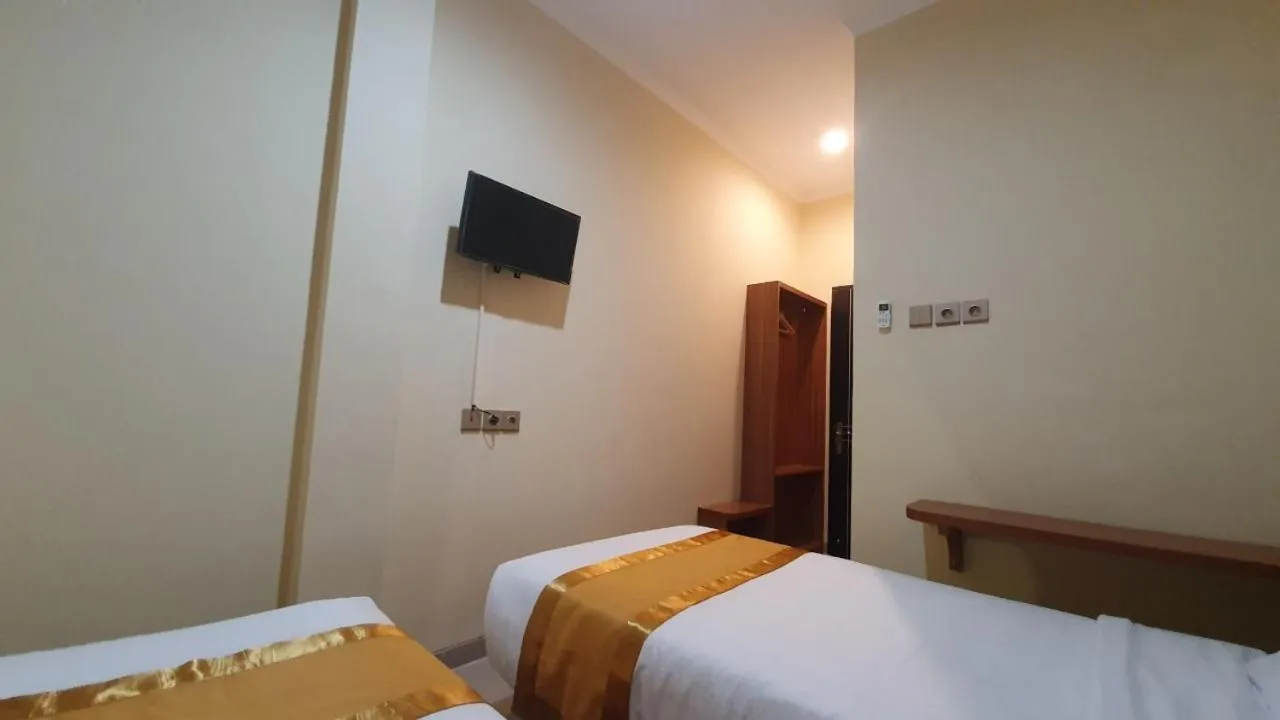 TV and multimedia, Bed in Harmony Inn Belitung - City Hotel