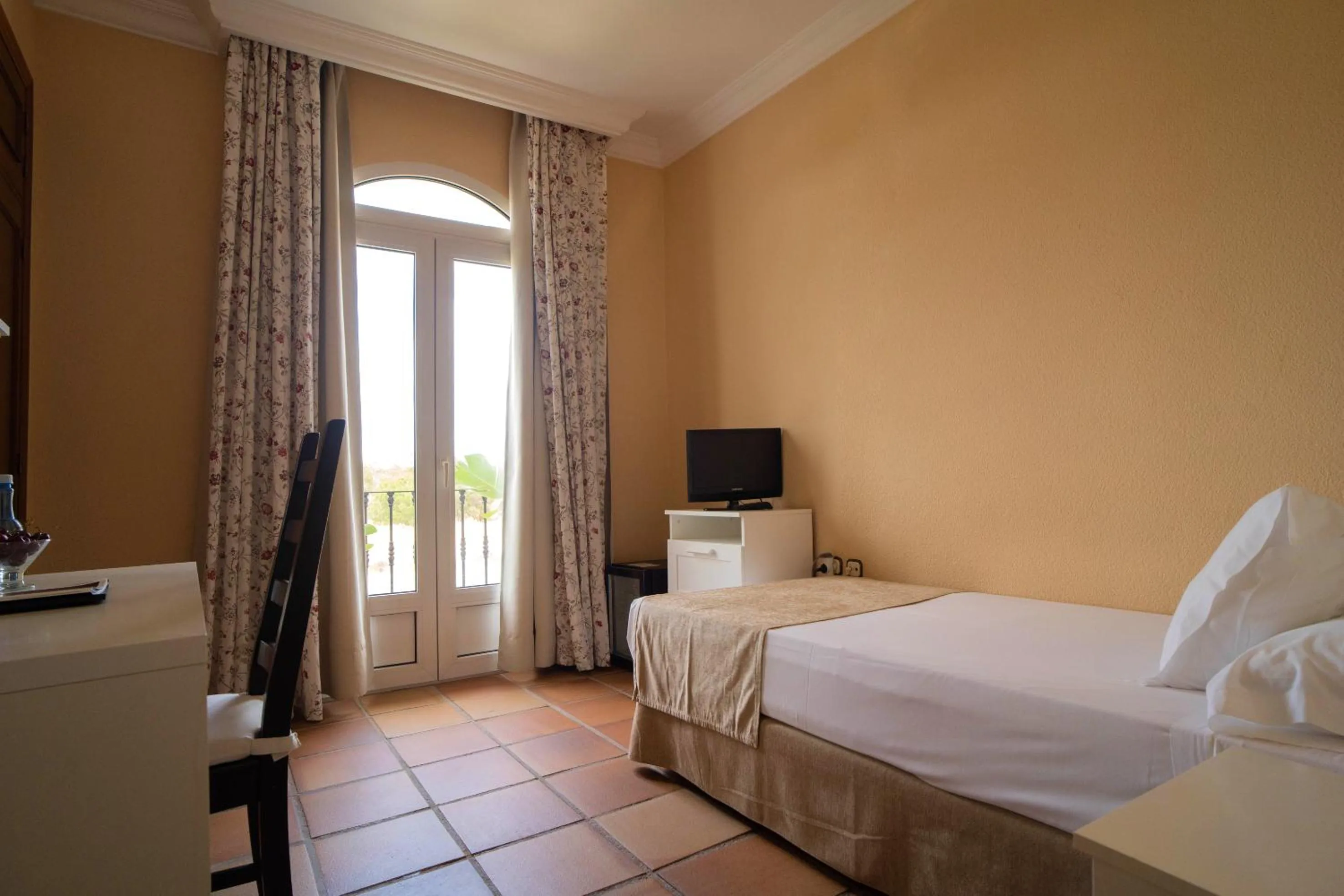 Property building, Bed in Hotel Albaida Nature