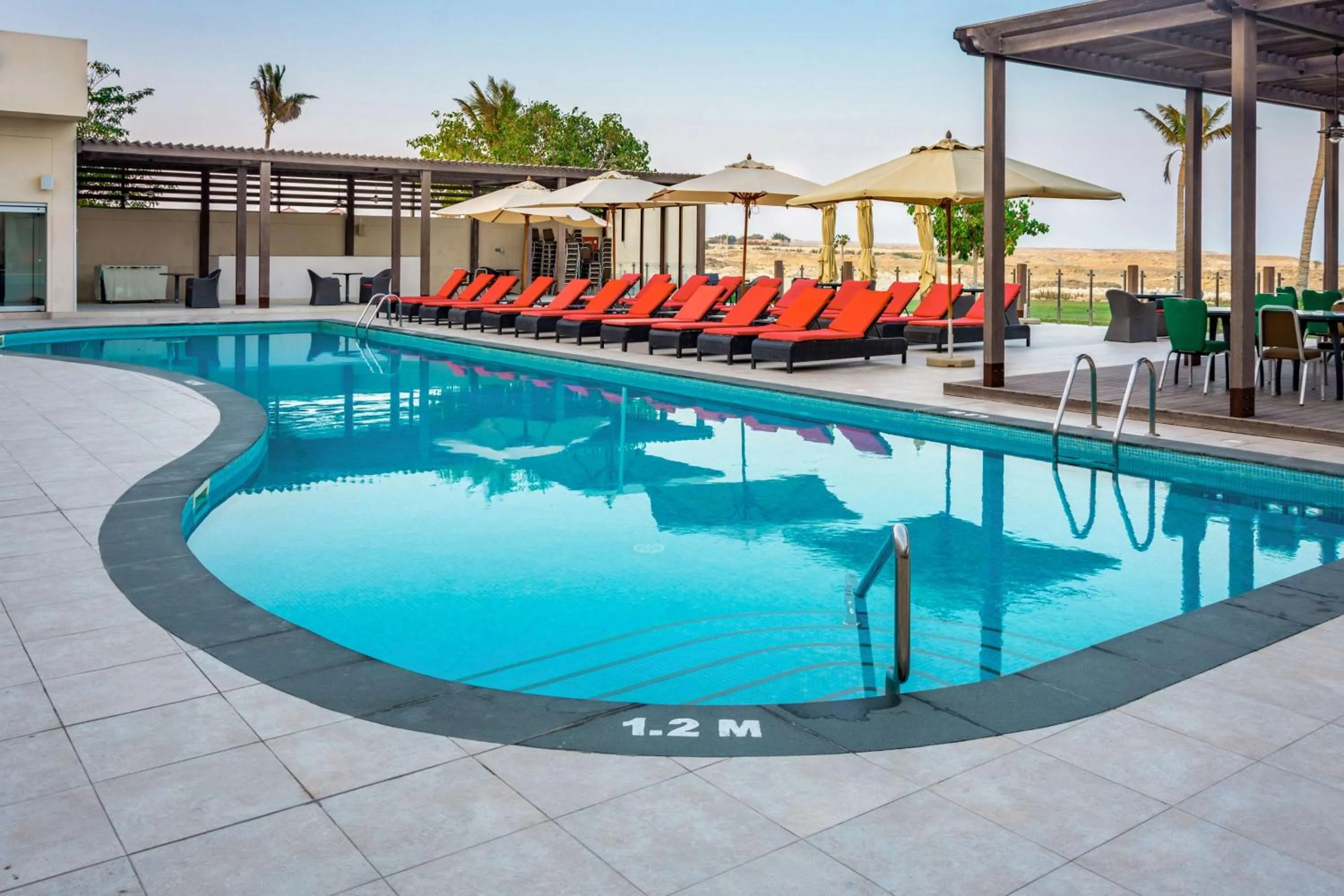 Pool view in Park Inn by Radisson Hotel and Residence Duqm