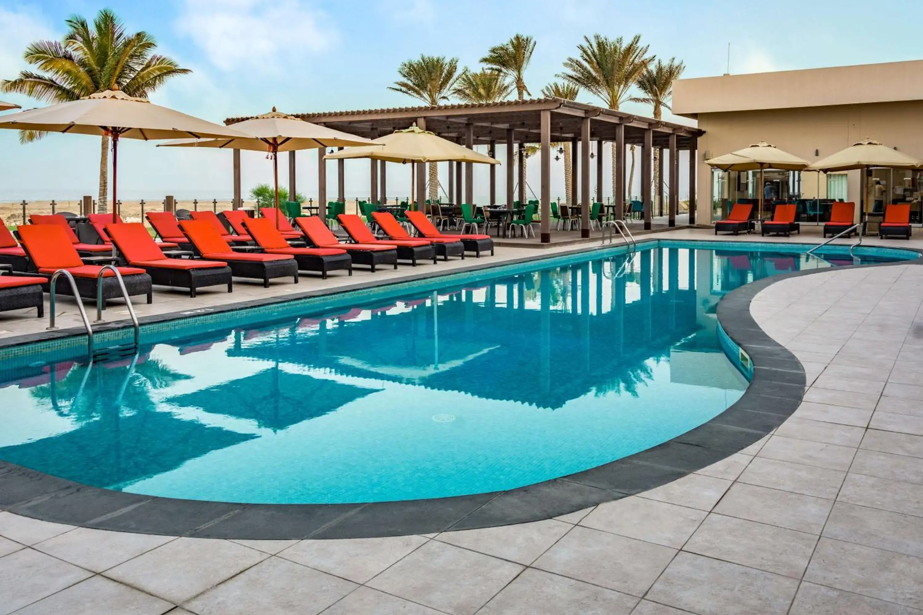 Pool view in Park Inn by Radisson Hotel and Residence Duqm Pool view in Park Inn by Radisson Hotel and Residence Duqm