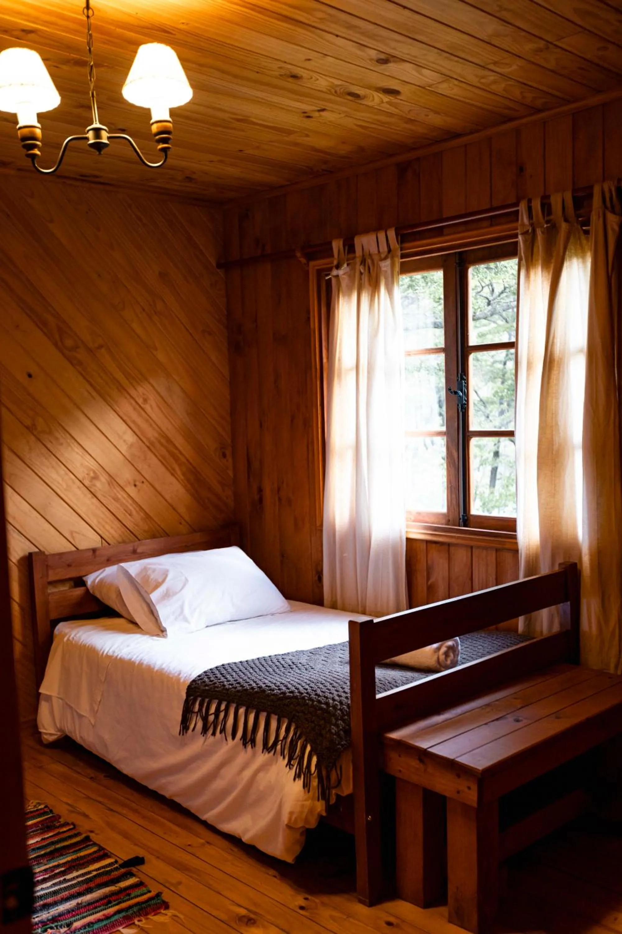 Bed in Green Baker Lodge