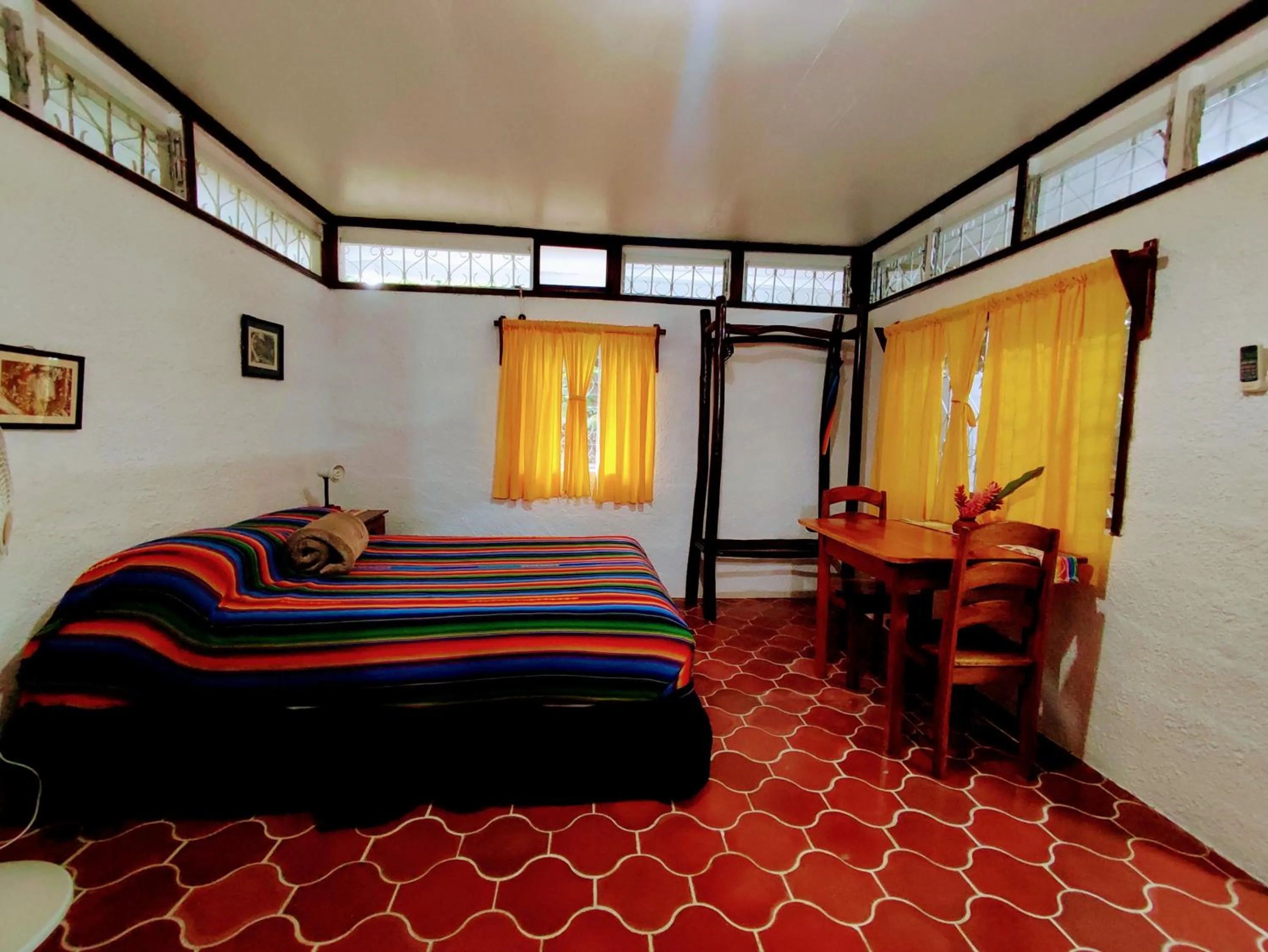 Bed in Maya Mountain Lodge