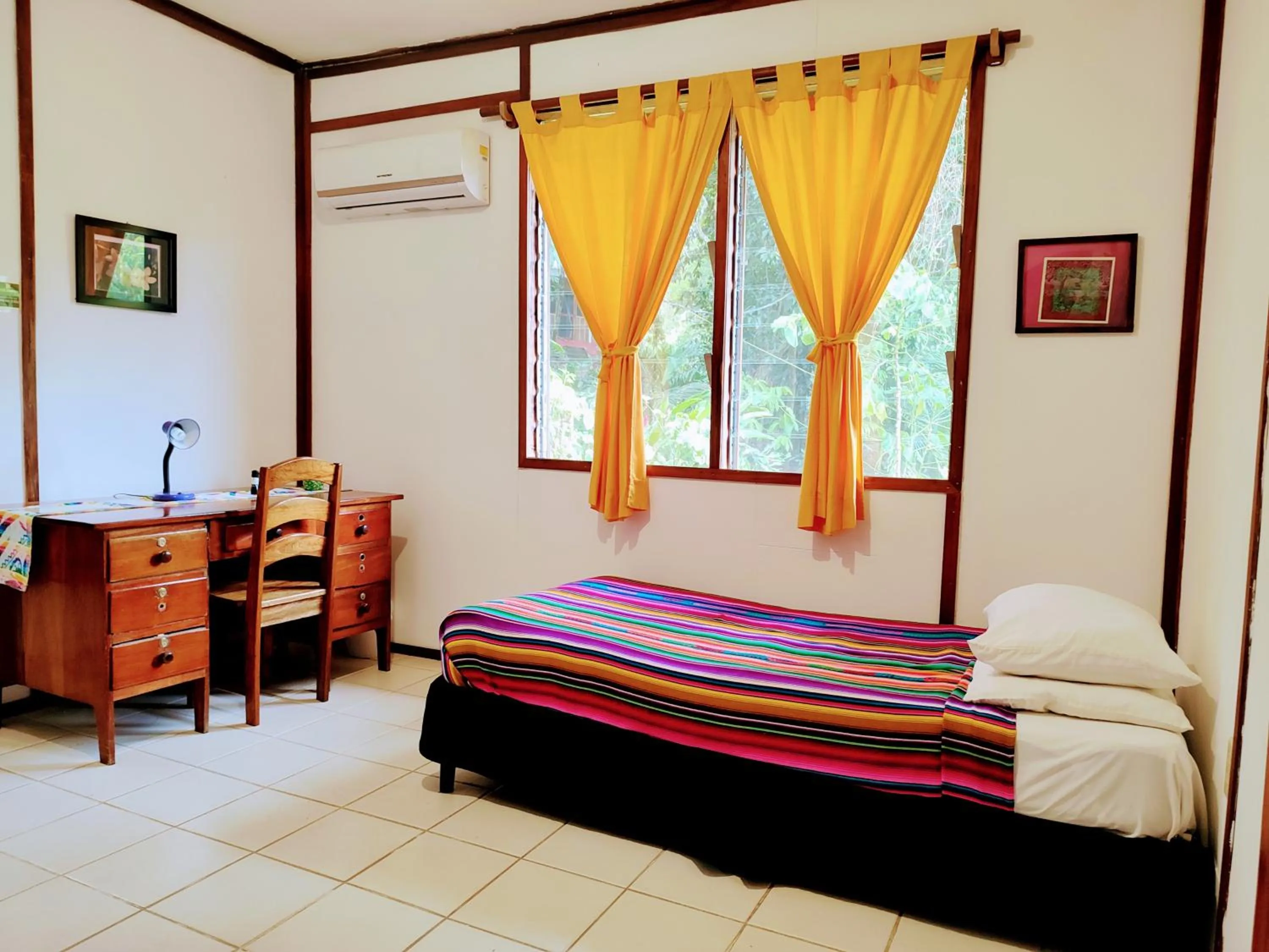 Bed in Maya Mountain Lodge