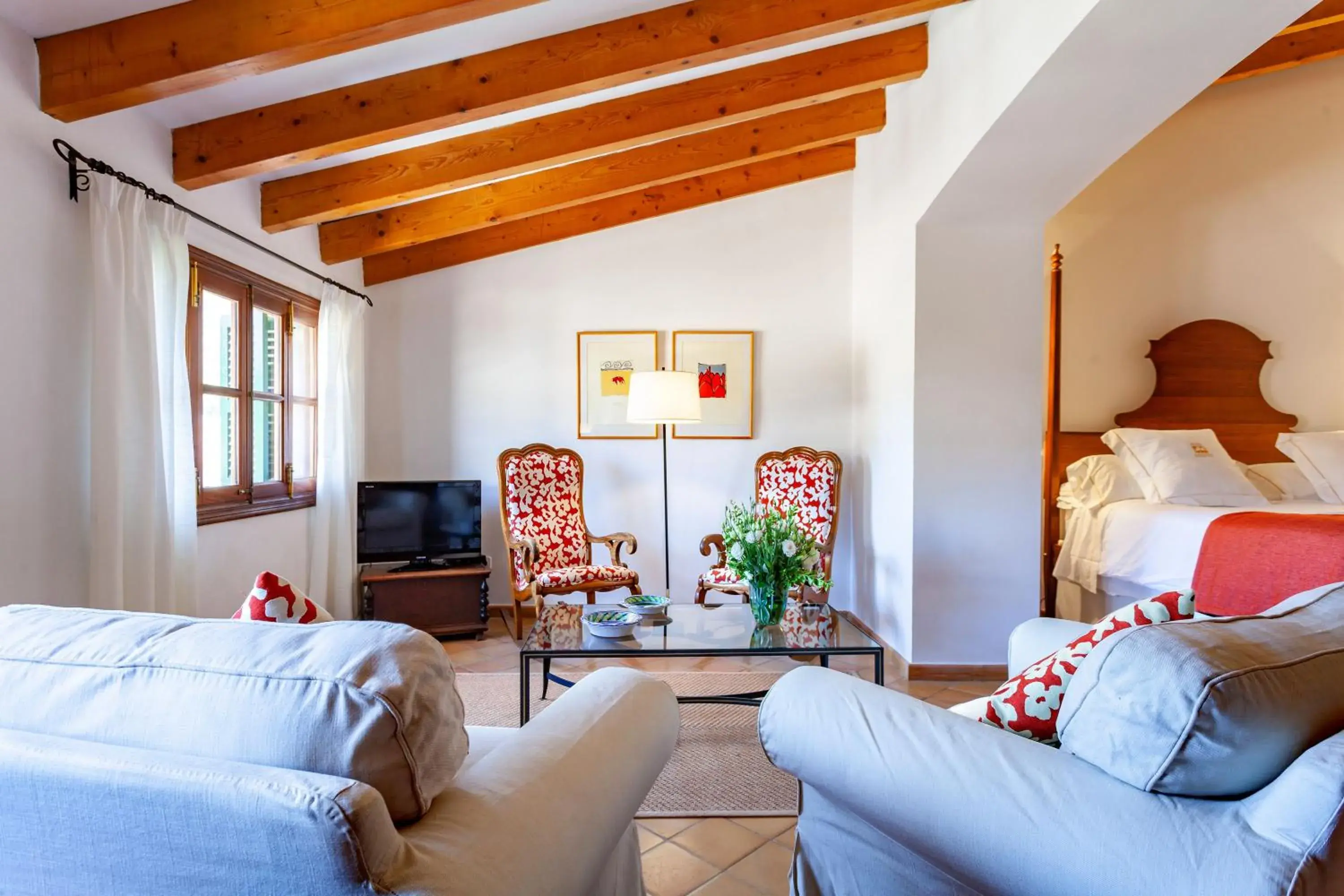 Seating area, Bed in Finca Hotel Son Palou Seating area, Bed in Finca Hotel Son Palou