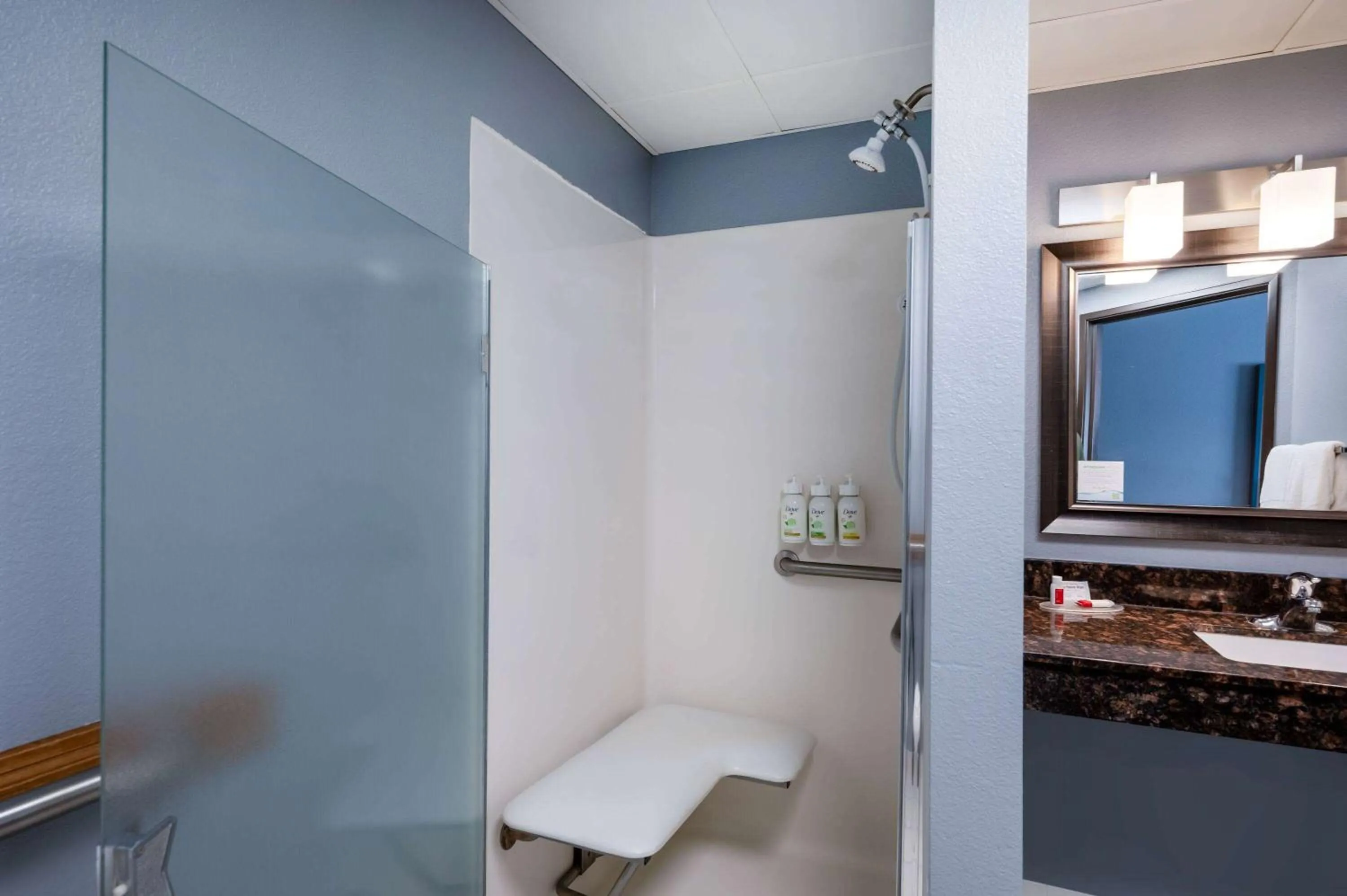 Shower in AmericInn by Wyndham Eau Claire