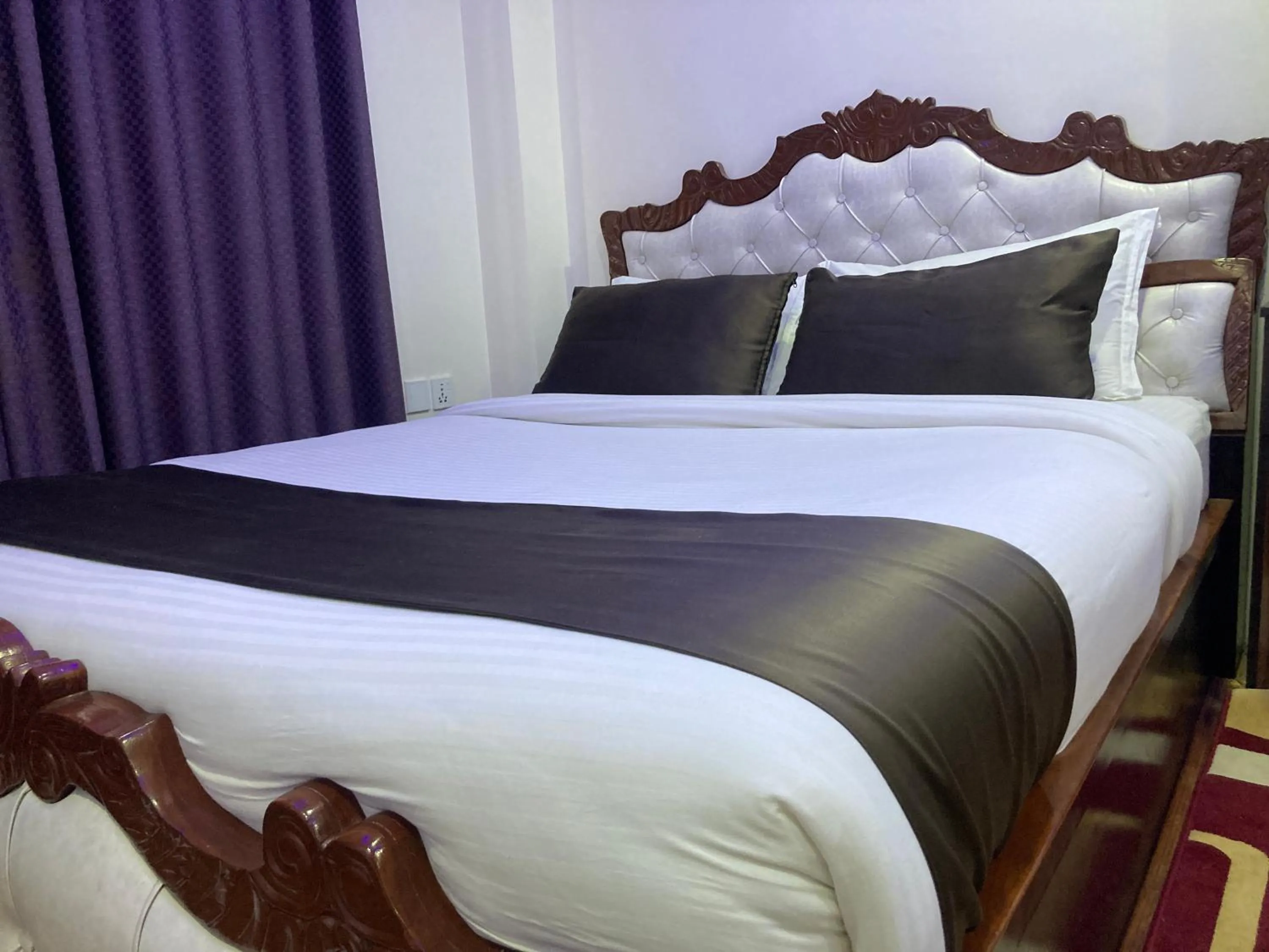 Bed in Dream Palace Resort