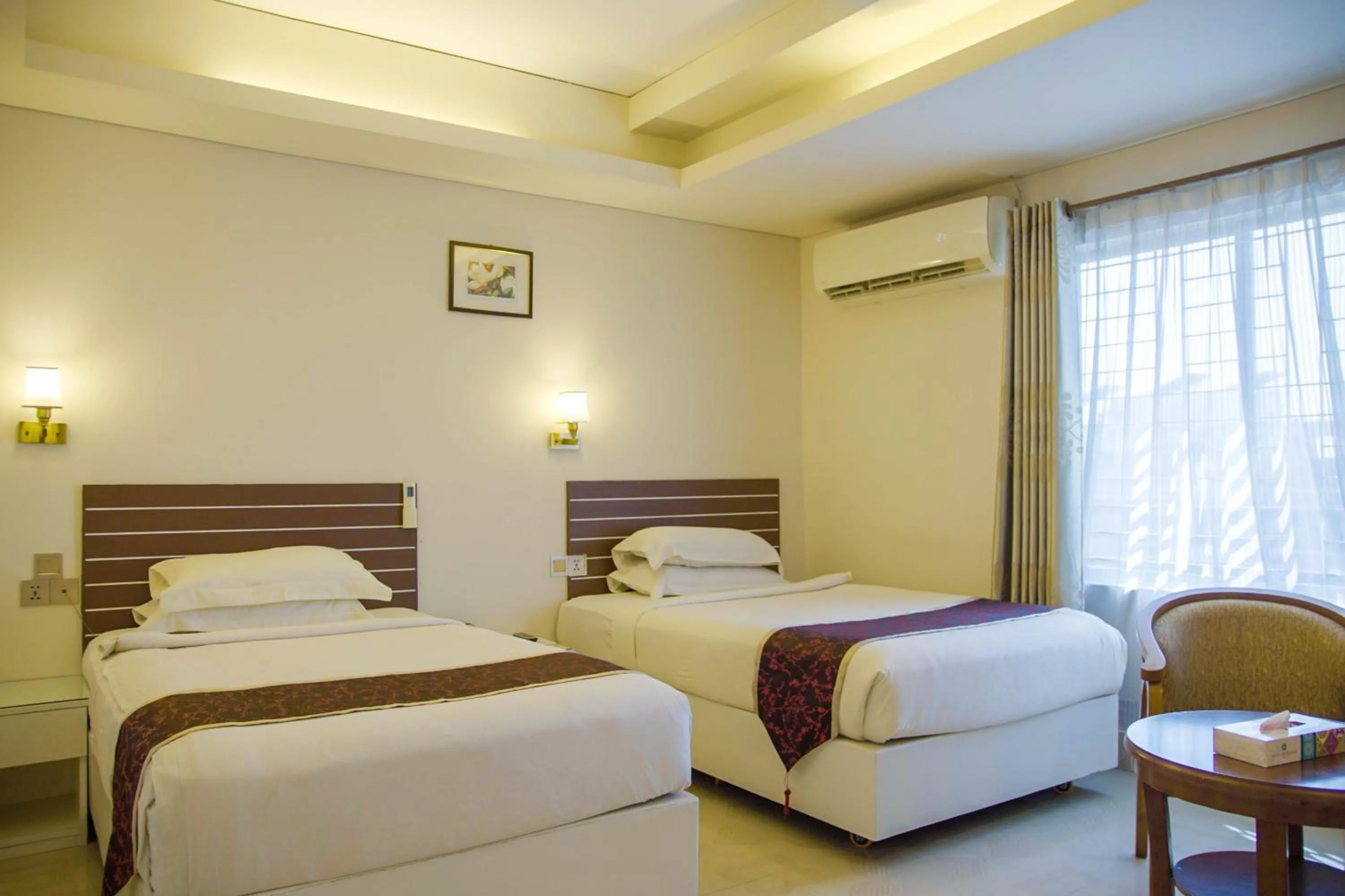 Bed in Hotel Shuktara Dhaka