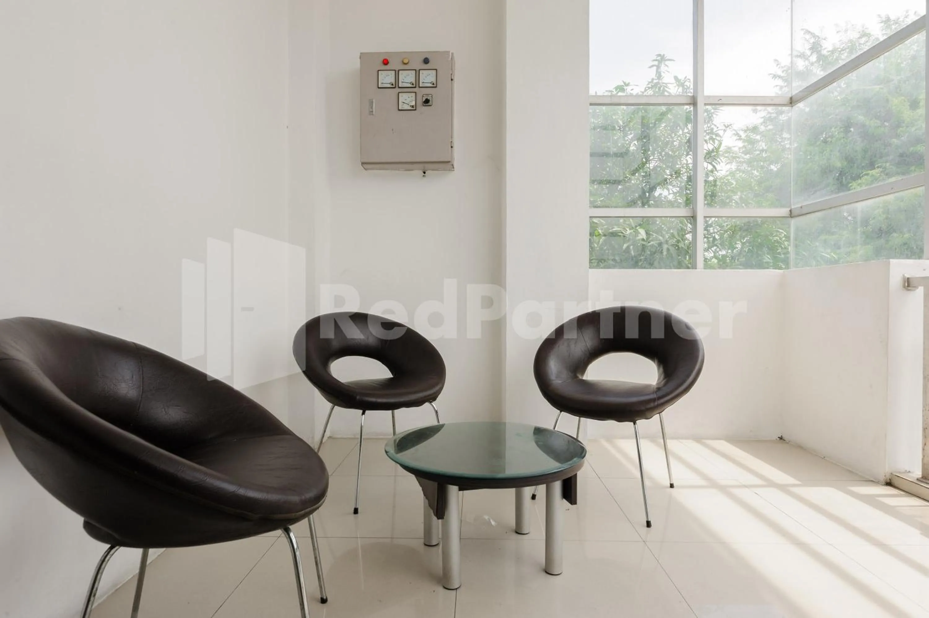 Seating area in RedDoorz at Wisma Nabila Syariah near Masjid Raya Baiturrahman Banda Aceh