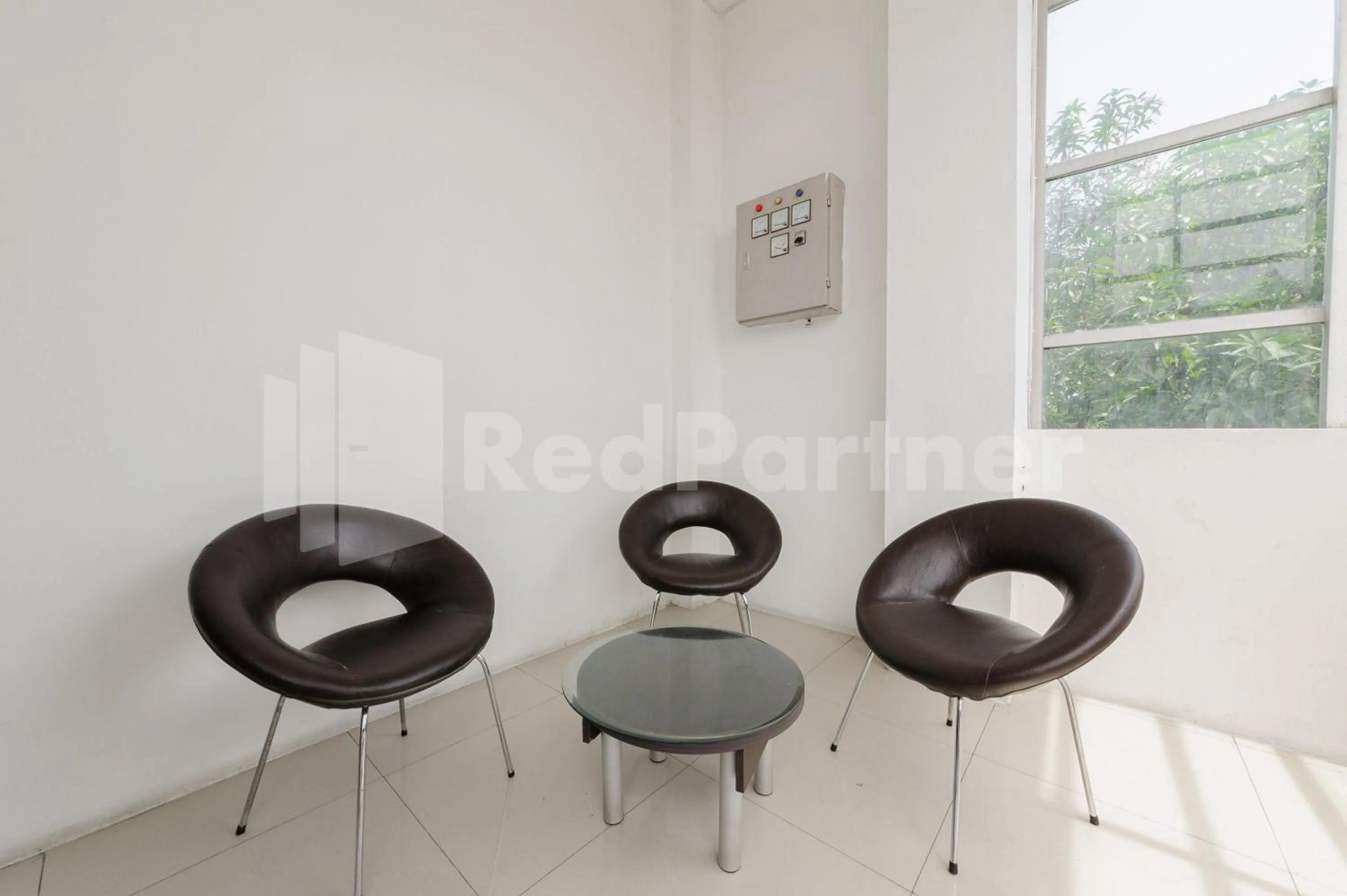Seating area in RedDoorz at Wisma Nabila Syariah near Masjid Raya Baiturrahman Banda Aceh