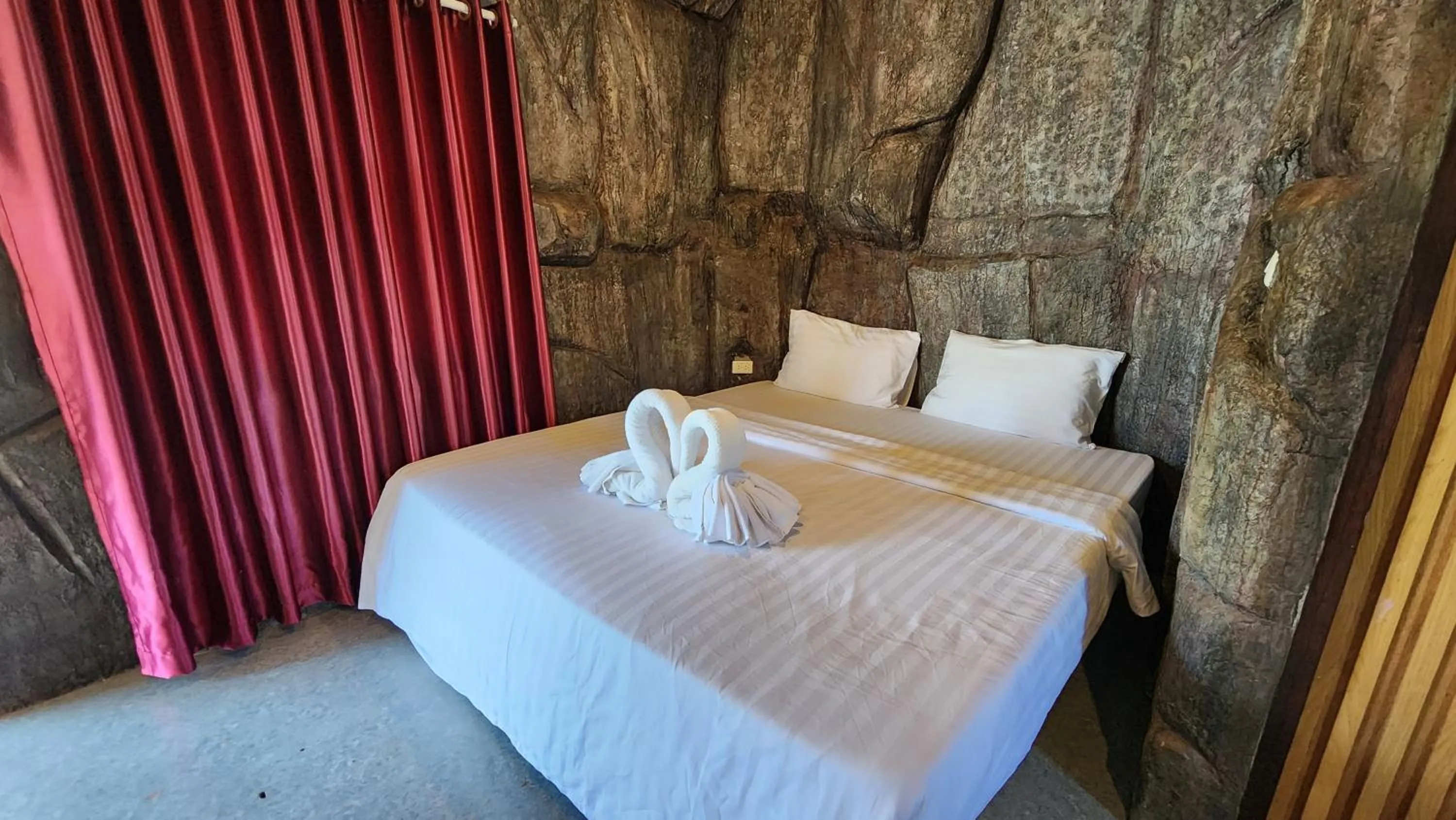 Bed in บ้านไร่ วรรณ วาลย์ รีสอร์ท