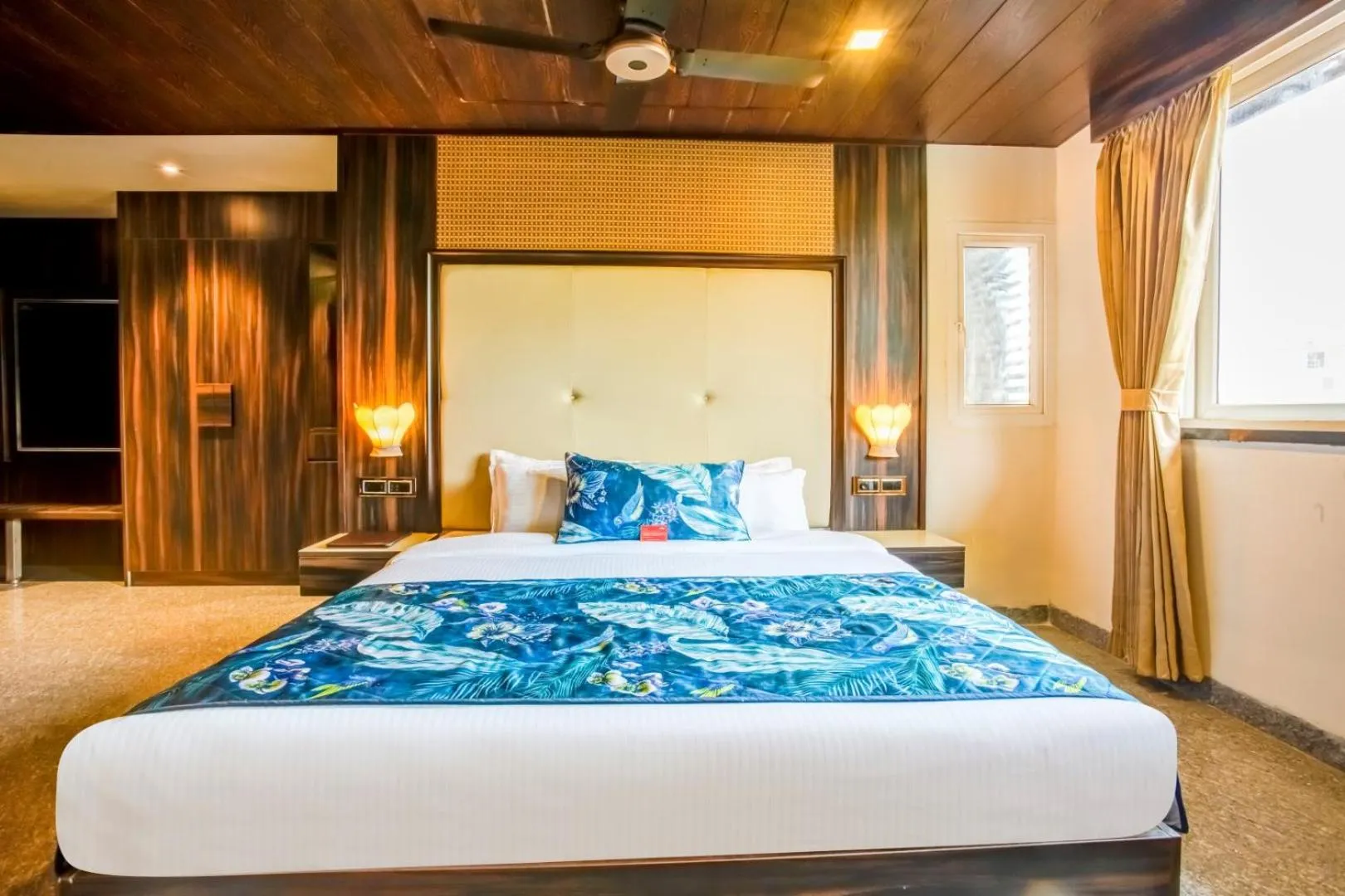 Bed in Summit Calangute Resort & Spa