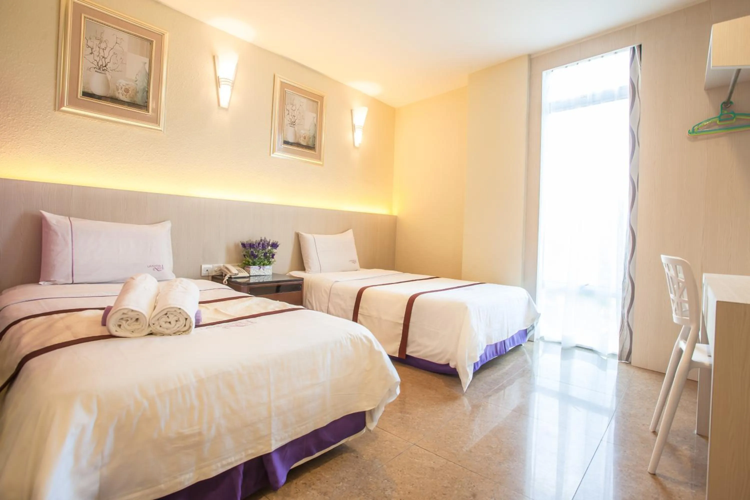 Photo of the whole room, Bed in Lavender Inn Nusa Bestari