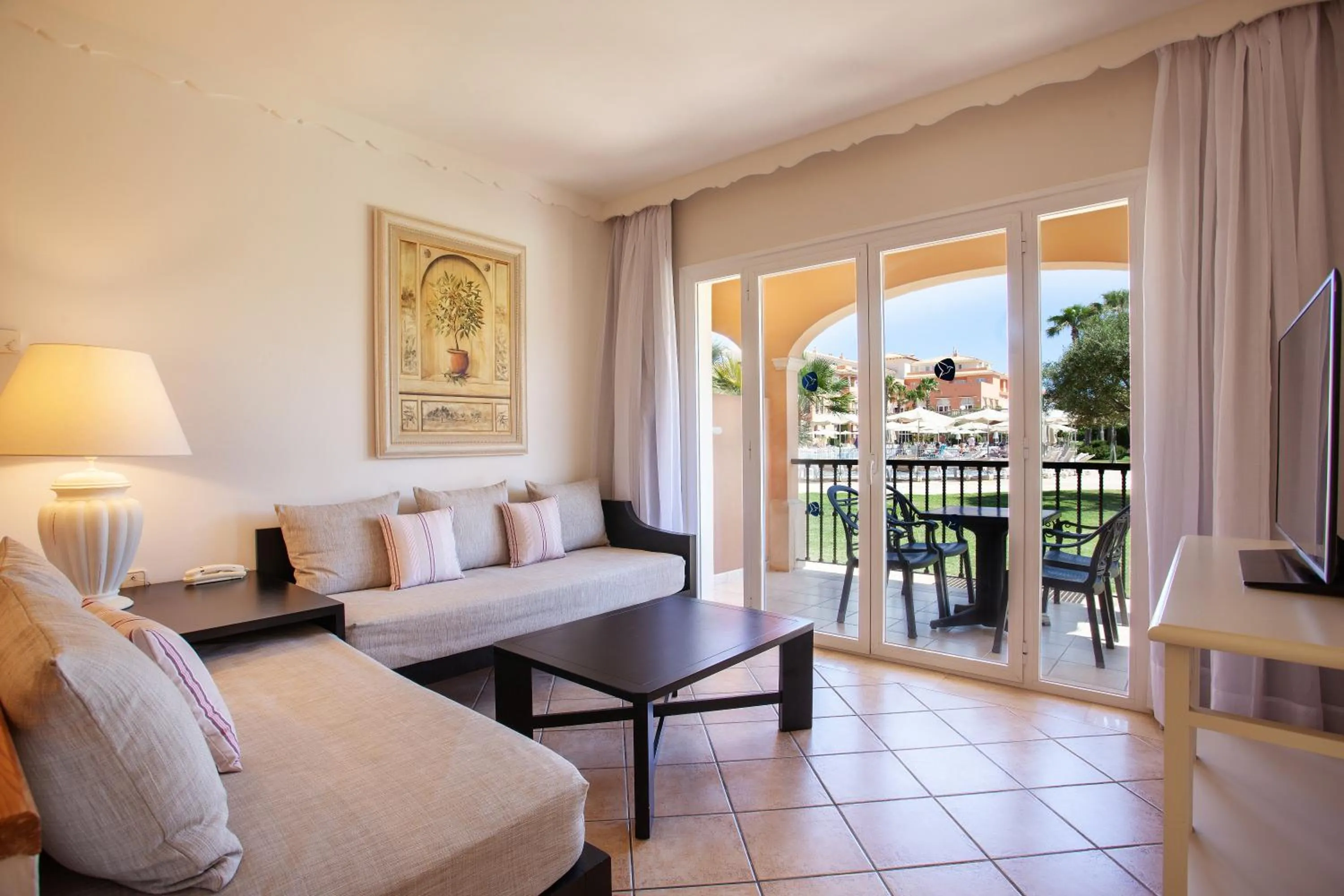 Living room, Bed in Grupotel Macarella Suites & Spa