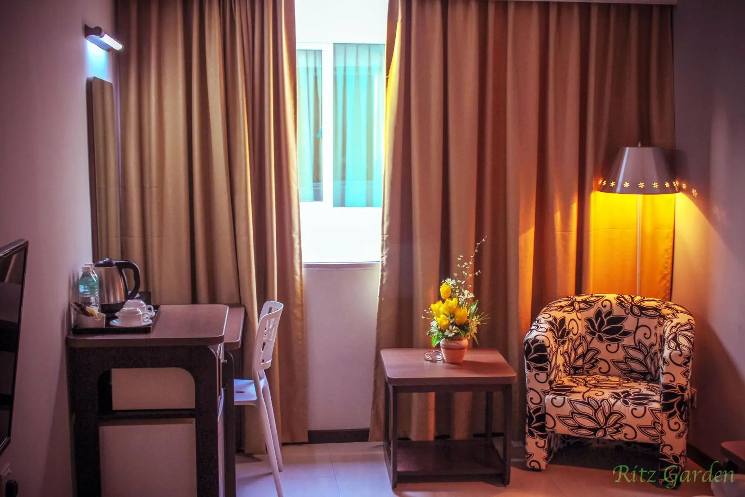 Seating area, Bed in Ritz Garden Hotel Manjung Seating area, Bed in Ritz Garden Hotel Manjung