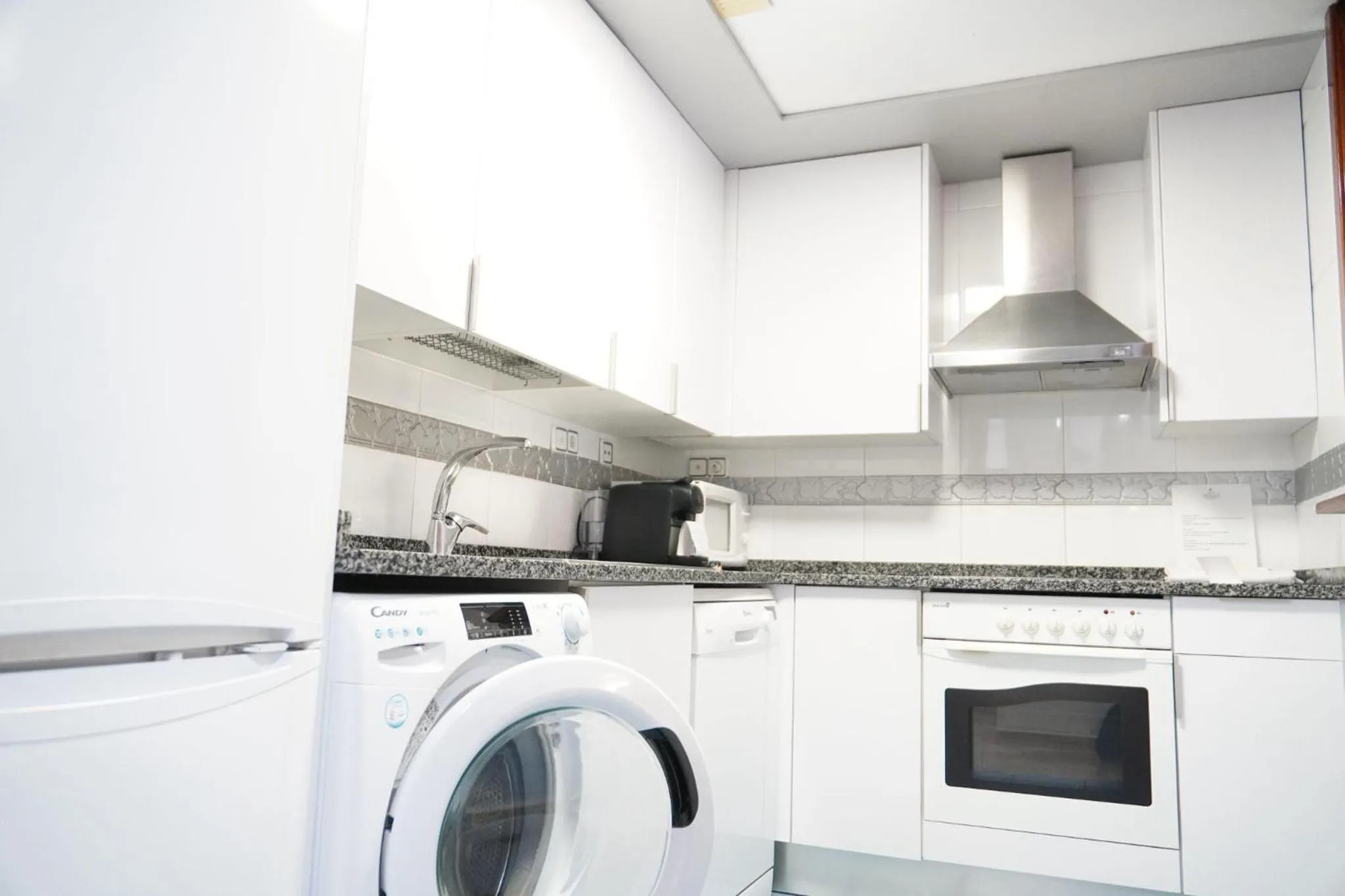 Kitchen or kitchenette in Aparthotel Los Girasoles