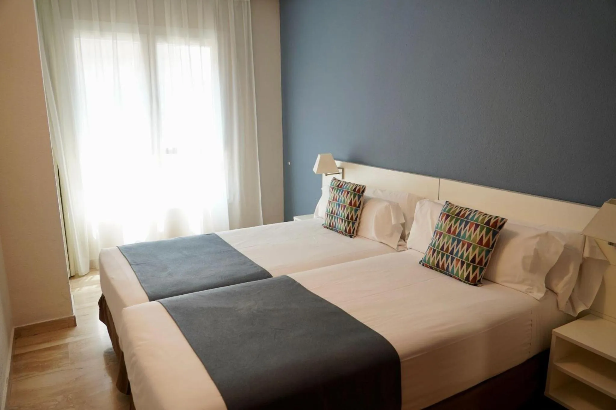 Bed in Aparthotel Los Girasoles