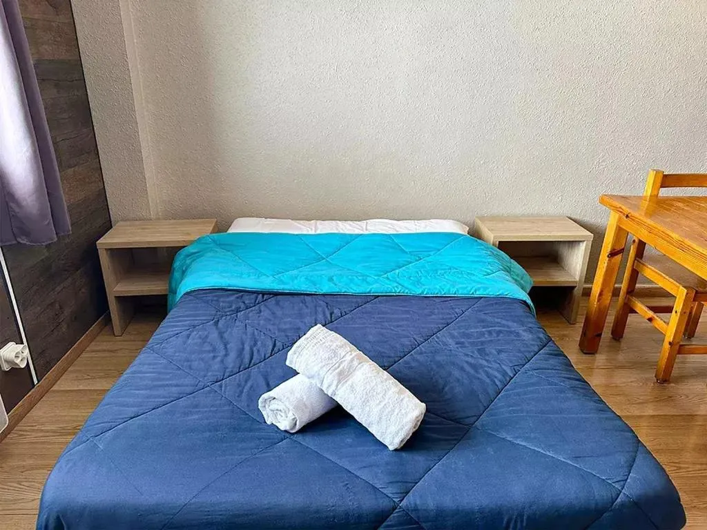 Bed in Apartamentos Solaris 3000