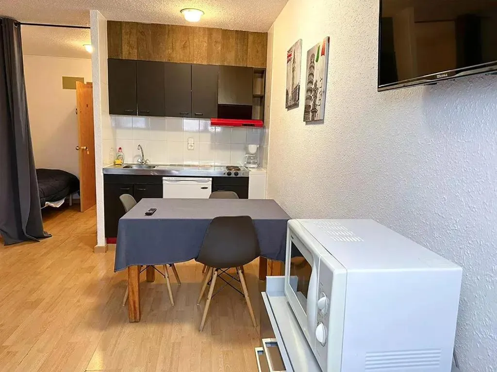 Dining area in Apartamentos Solaris 3000