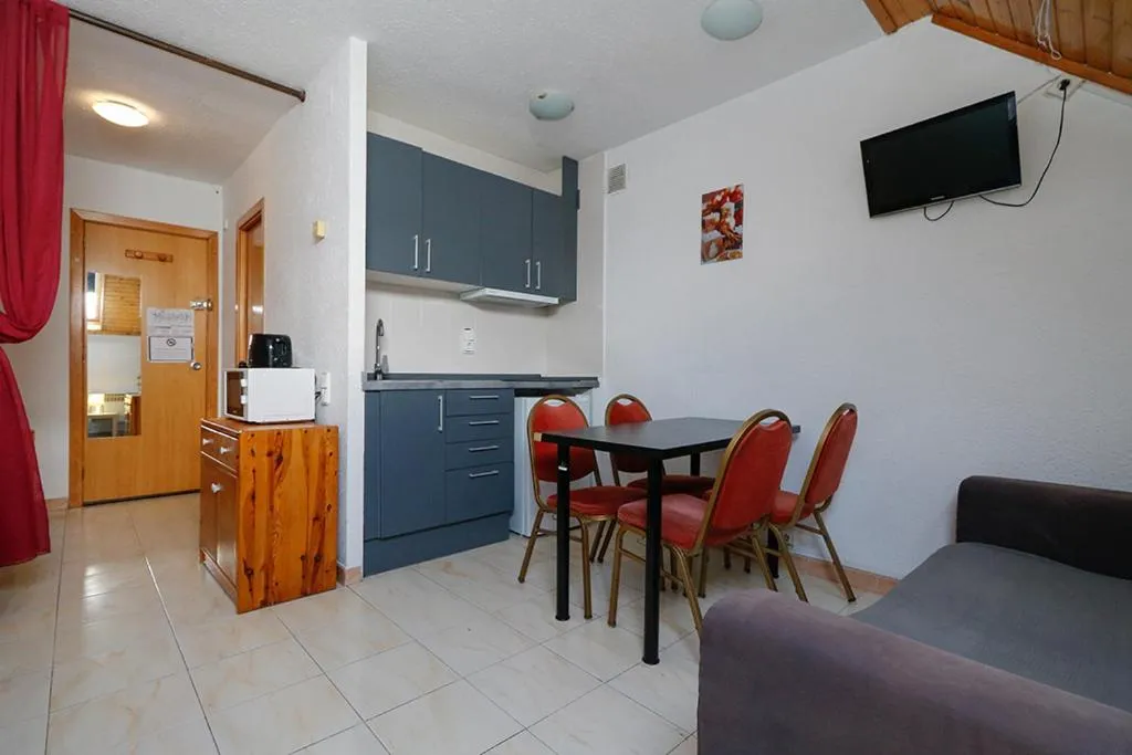 Dining area in Apartamentos Solaris 3000