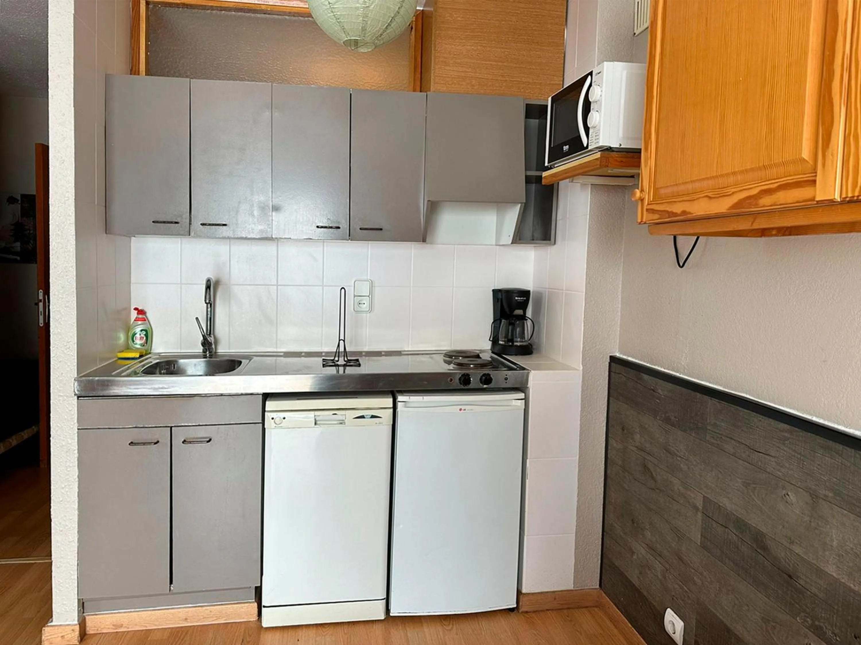 Kitchen or kitchenette in Apartamentos Solaris 3000
