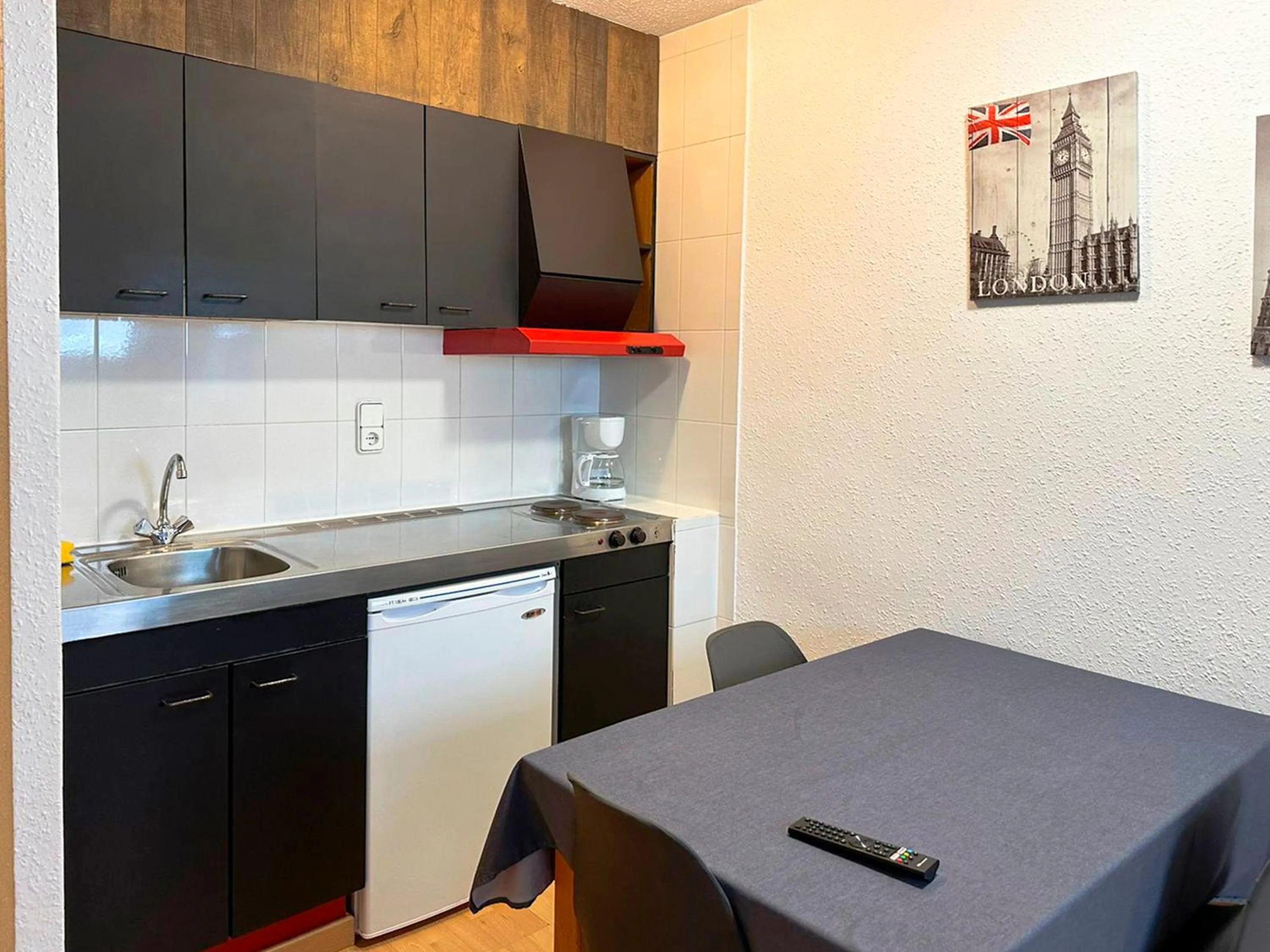 Kitchen or kitchenette in Apartamentos Solaris 3000
