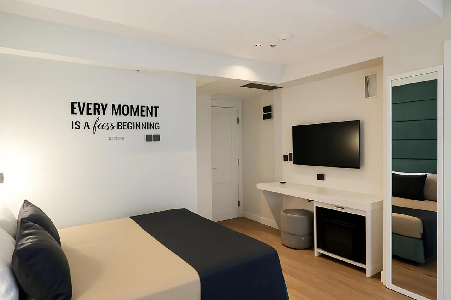 Bed in AXU AIRPORT HOTEL