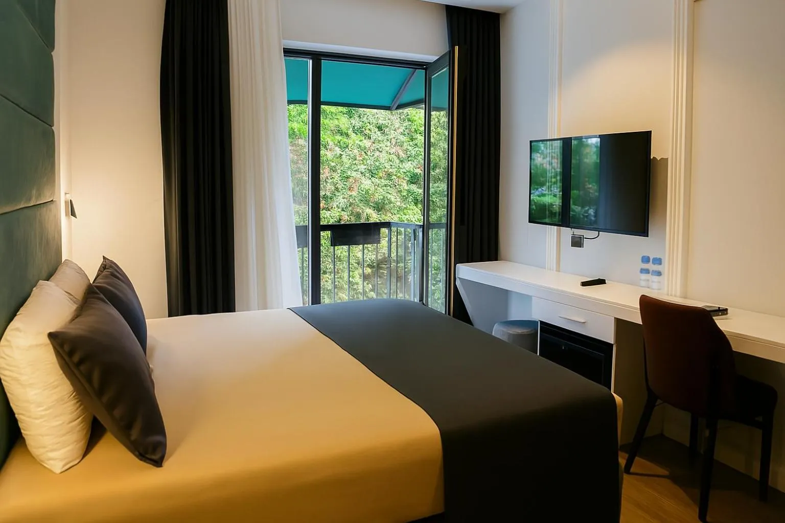 Bed in AXU AIRPORT HOTEL