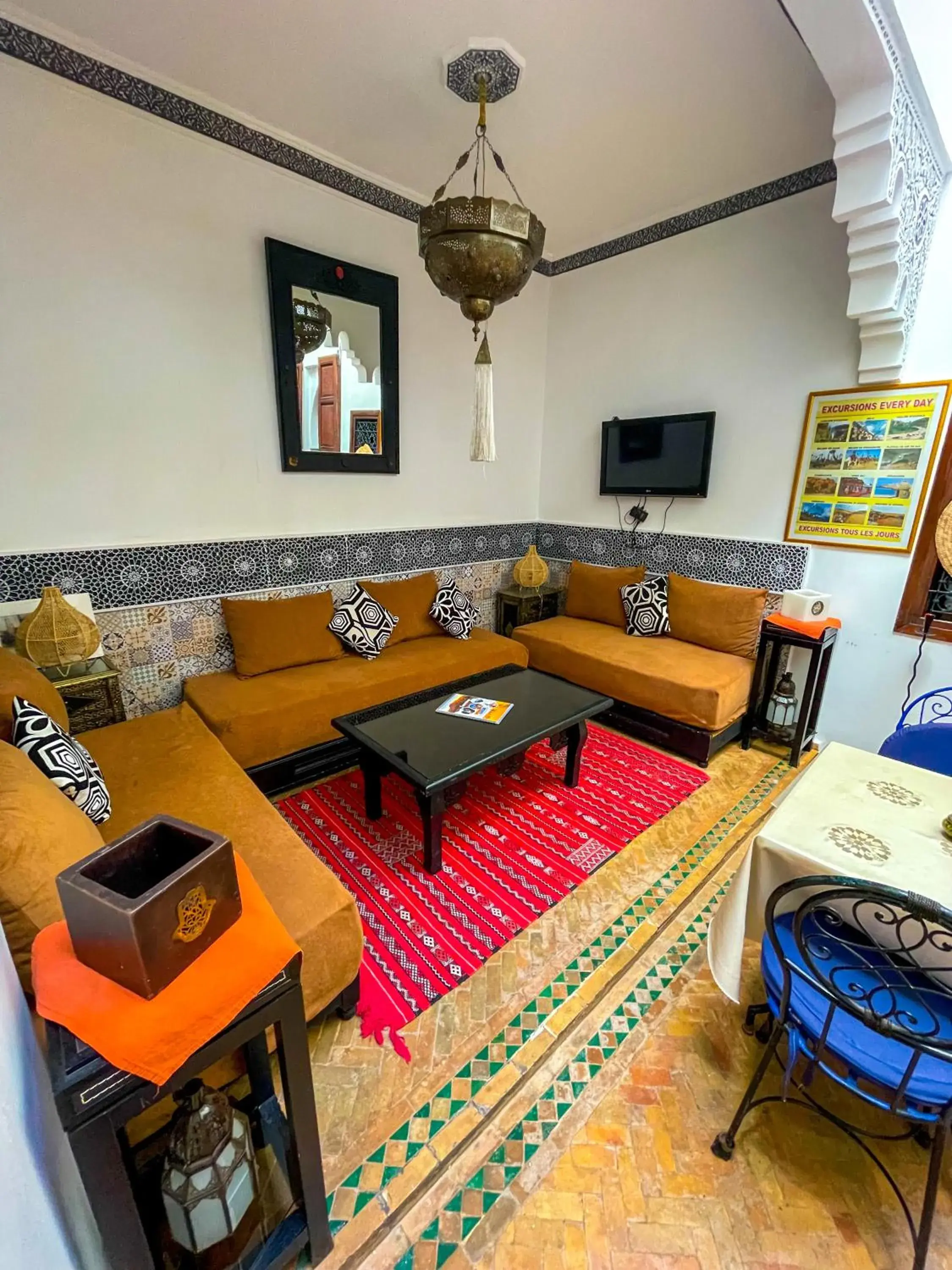 Communal lounge/ TV room in Riad karim Communal lounge/ TV room in Riad karim