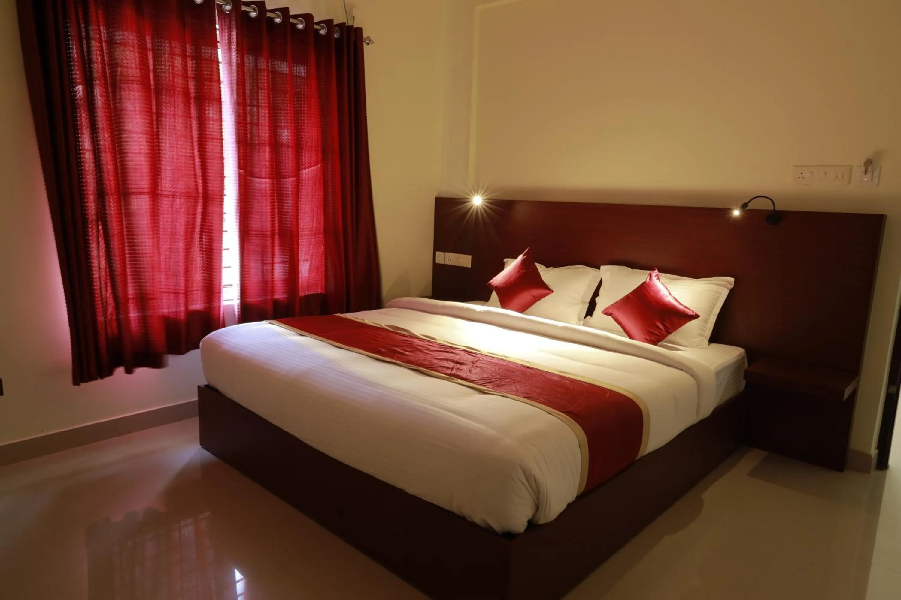 Bed in BLUEWAY RESIDENCY BUSINESS BOUTIQUE HOTEL