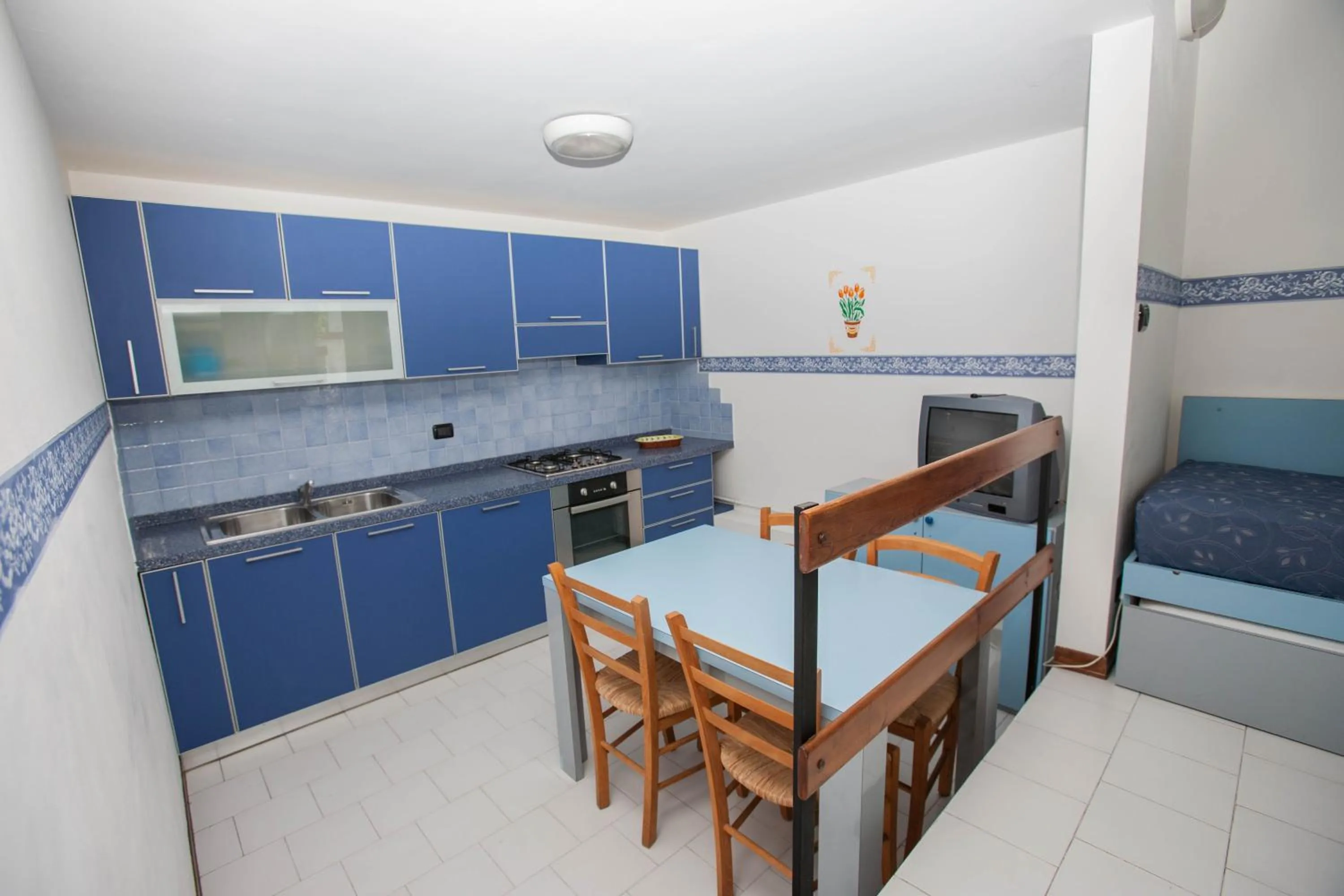 Kitchen or kitchenette in Residence RTA Villa Marina