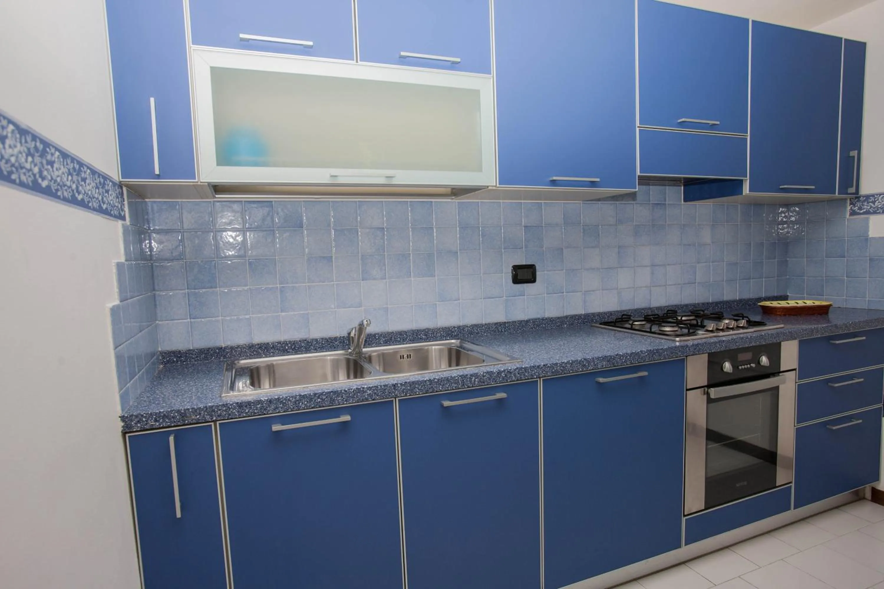 Kitchen or kitchenette in Residence RTA Villa Marina