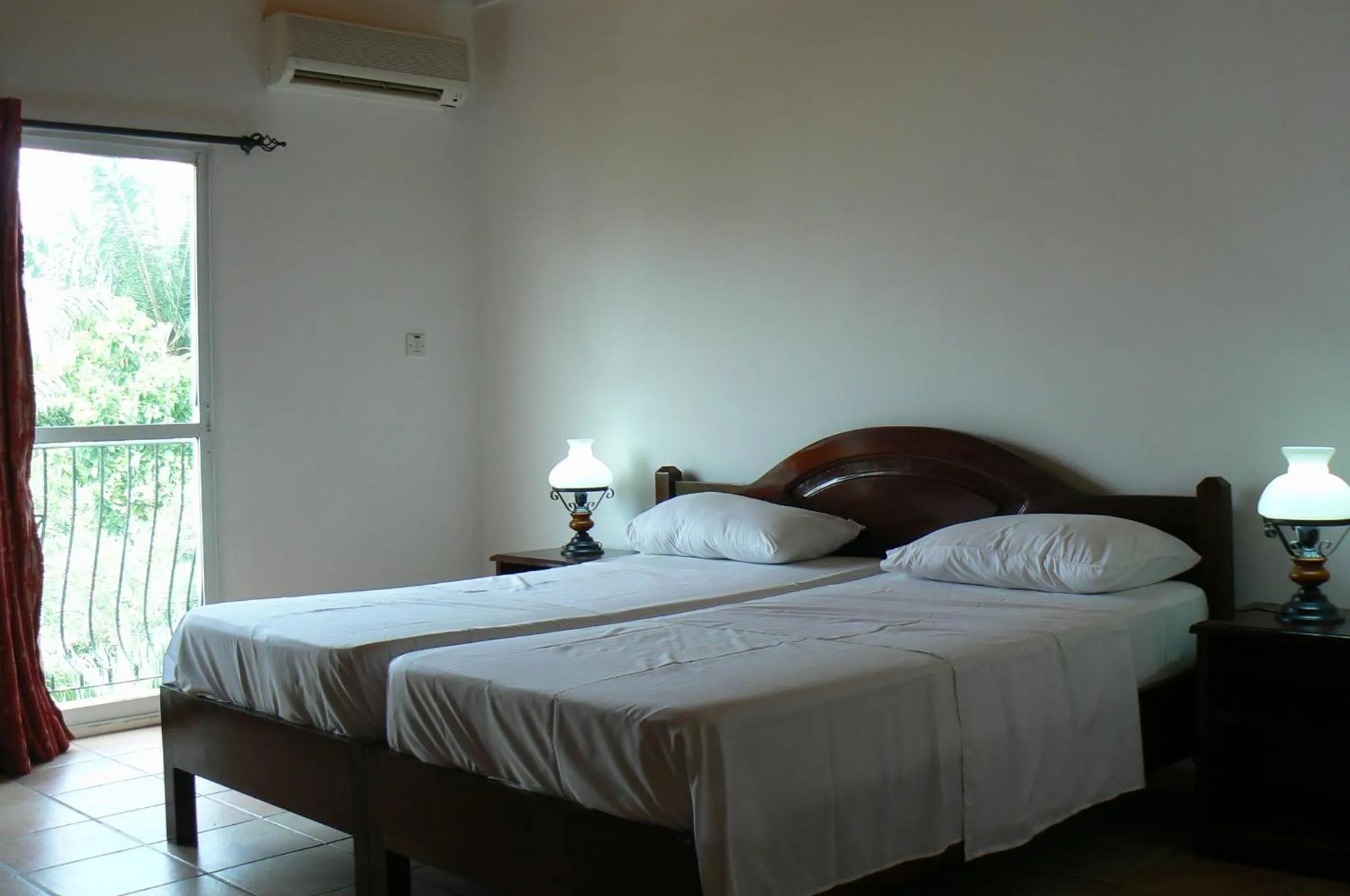 Bed in Riyan Apartment