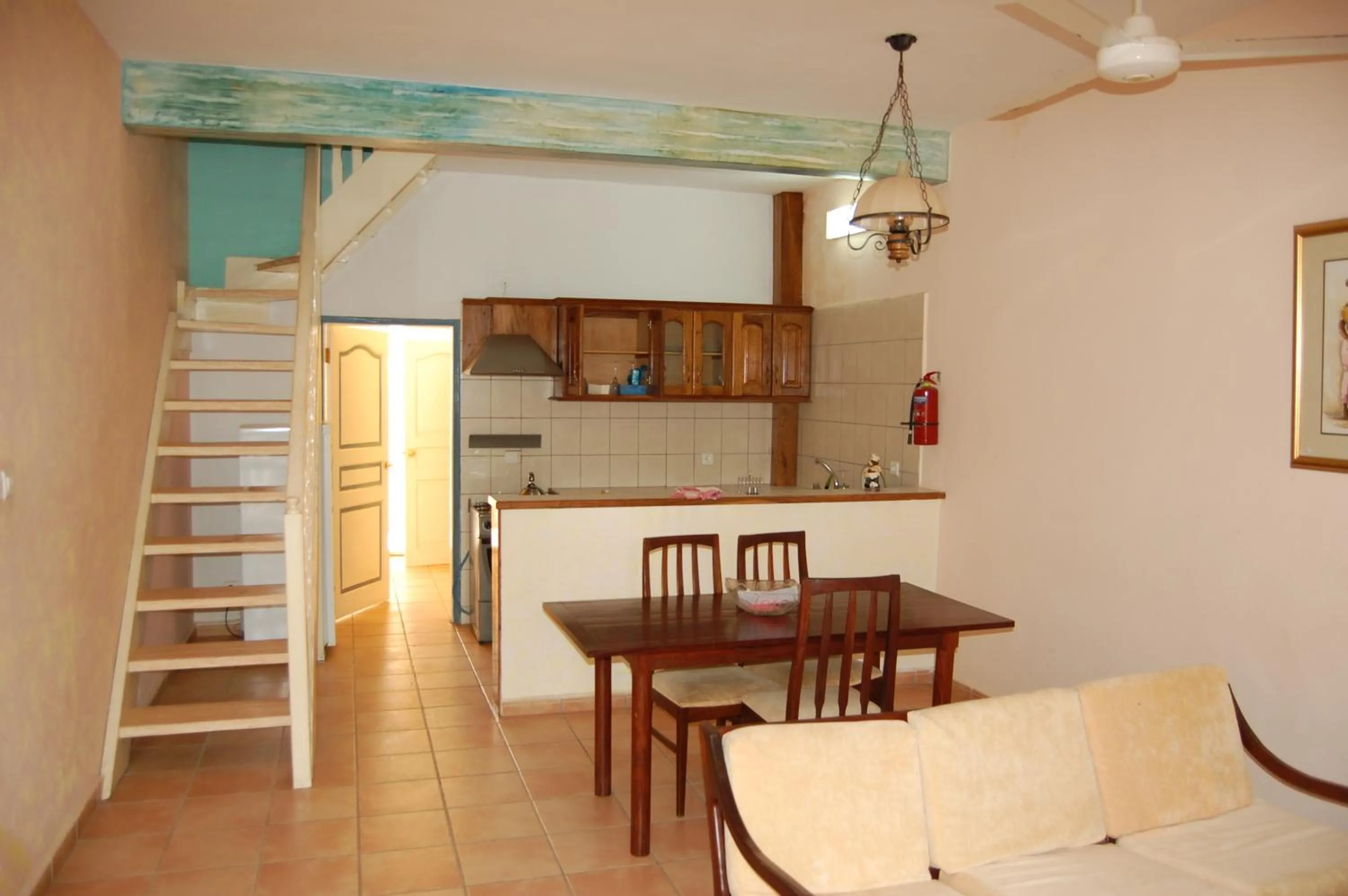 Kitchen or kitchenette in Riyan Apartment